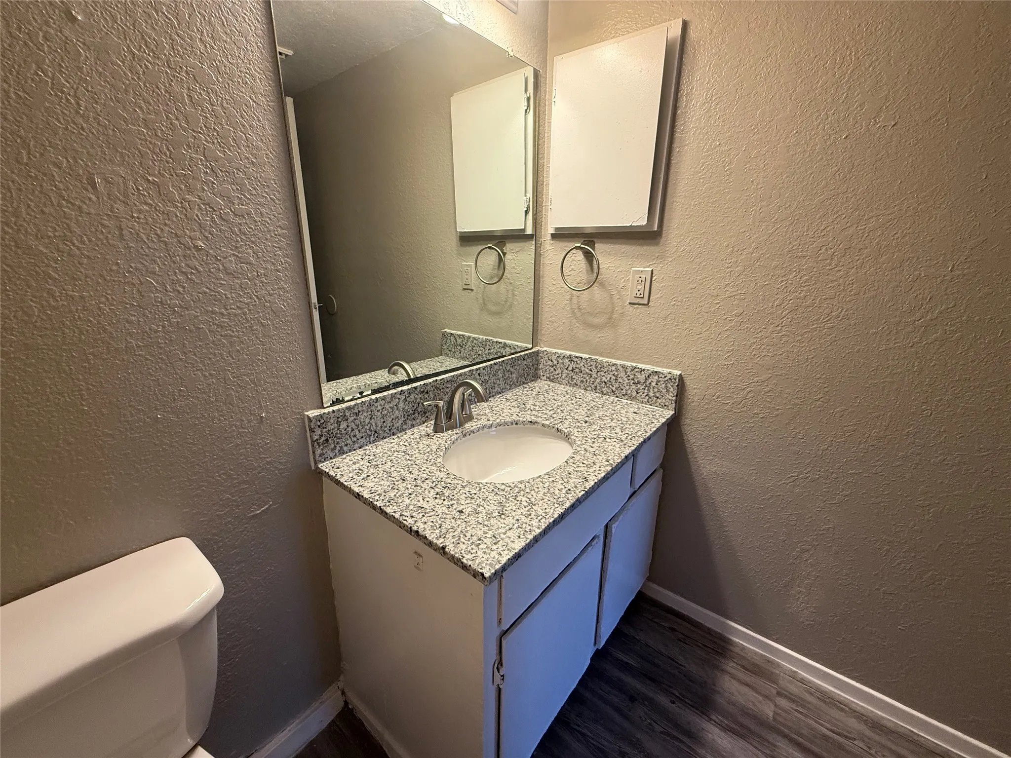 Brand new granite counters in kitchen and bathroom. This is the actual unit.