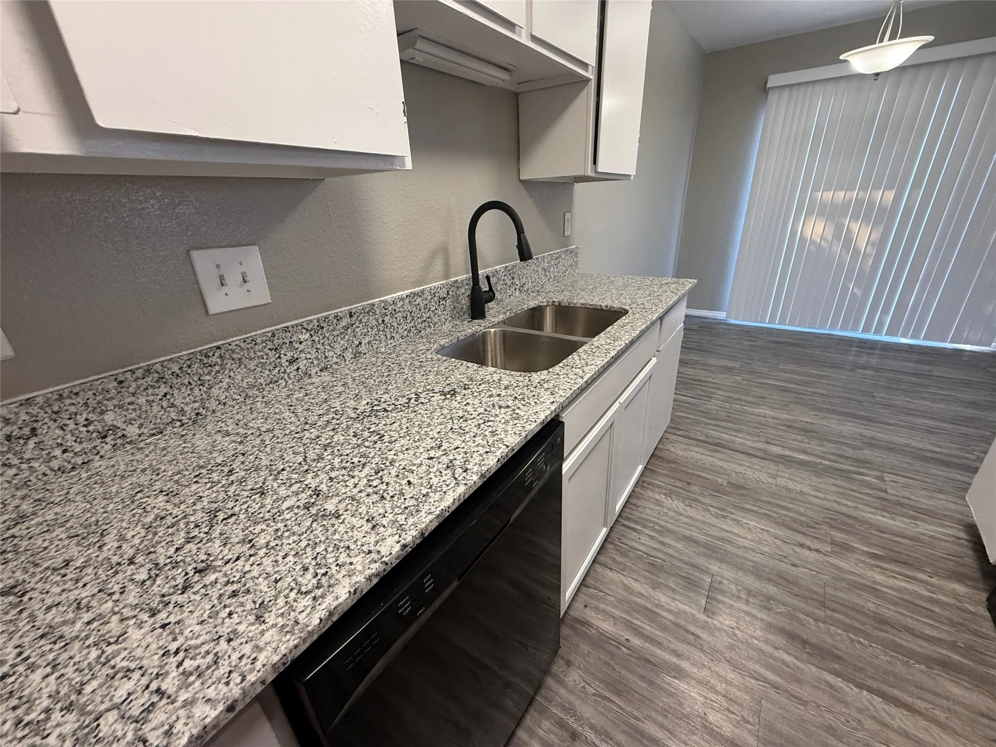 Brand new granite counters in kitchen and bathroom. This is the actual unit.