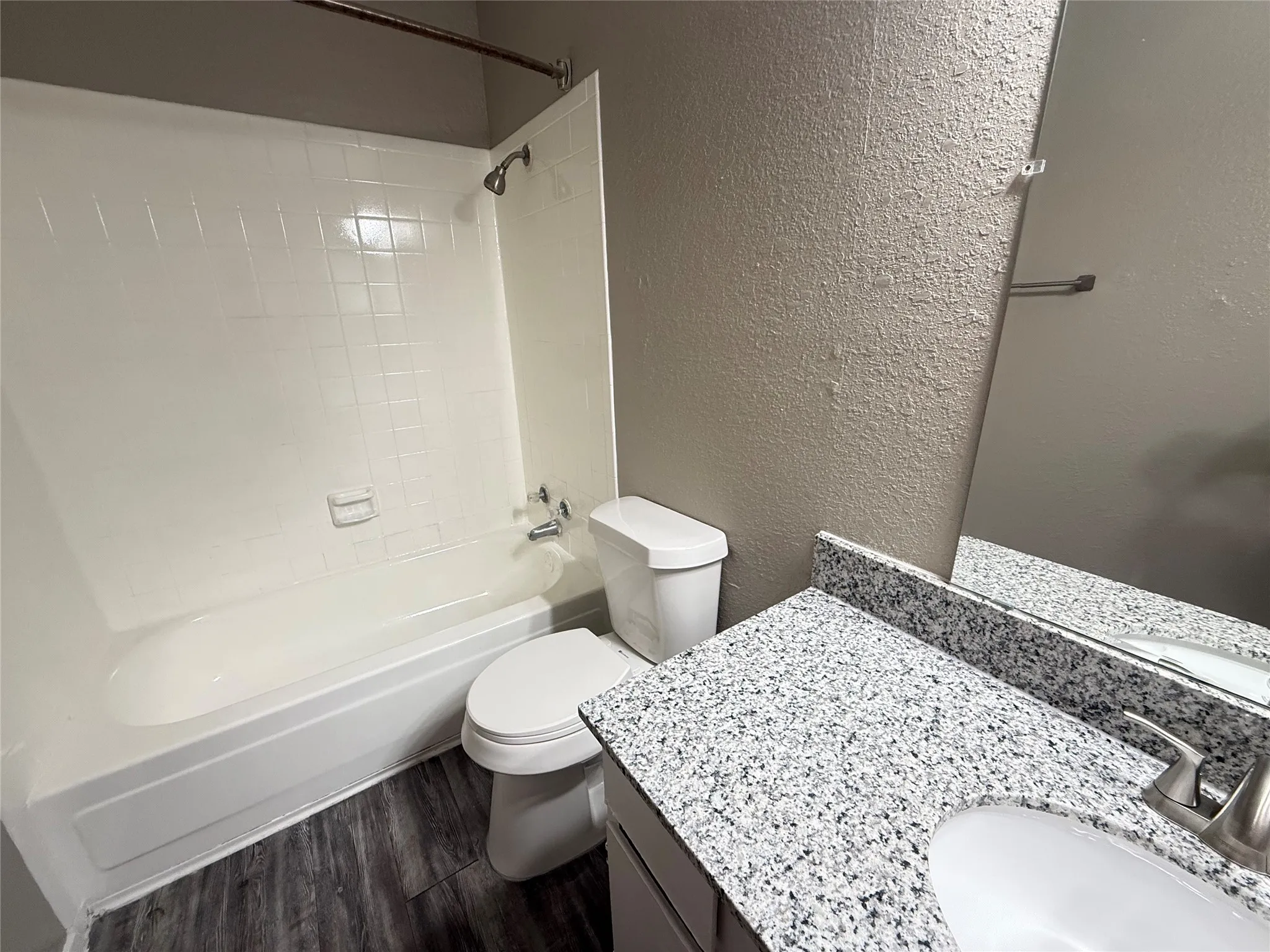 Brand new granite counters in kitchen and bathroom. This is the actual unit.
