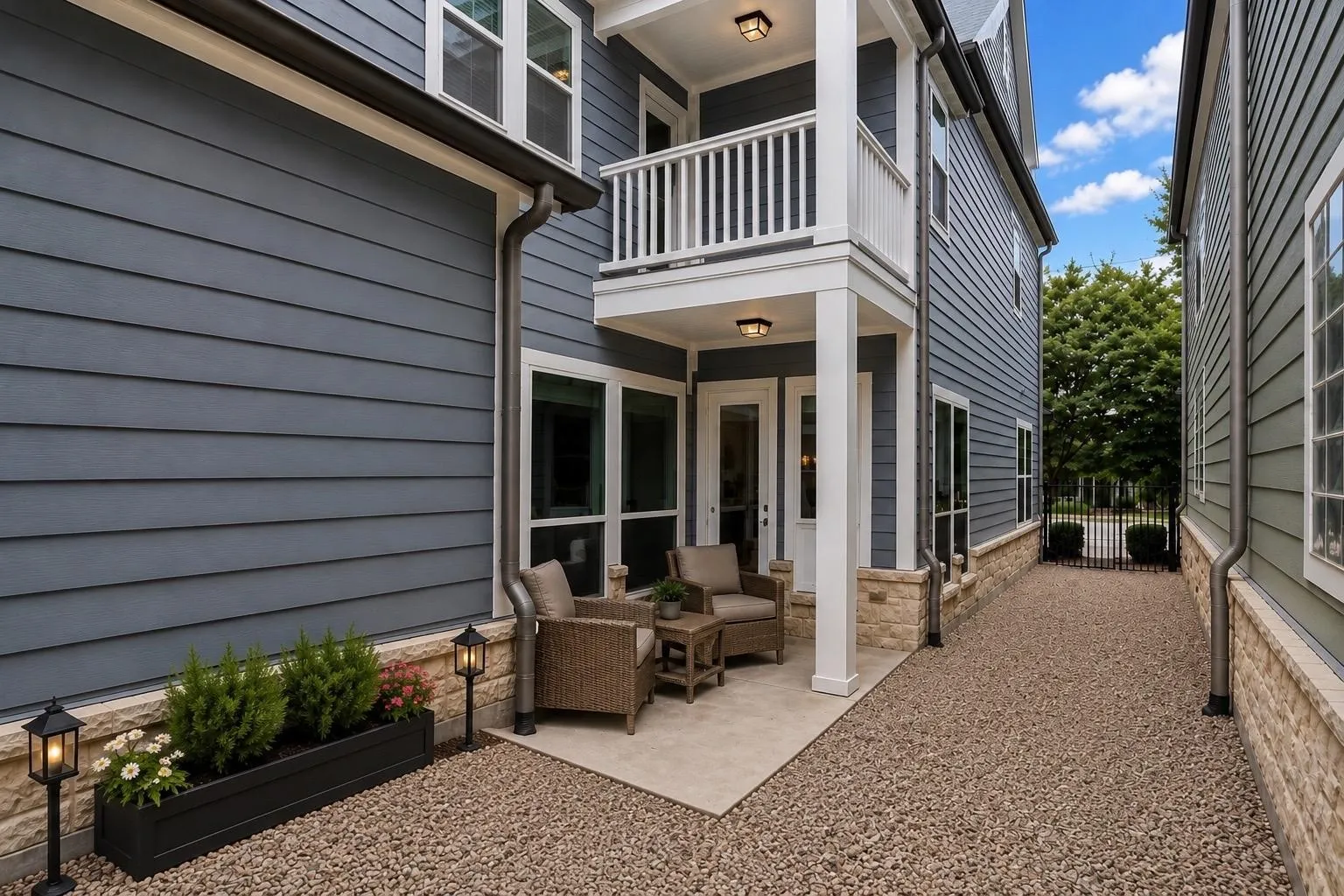 Low-maintenance outdoor patio and courtyard.*Furniture digitally staged