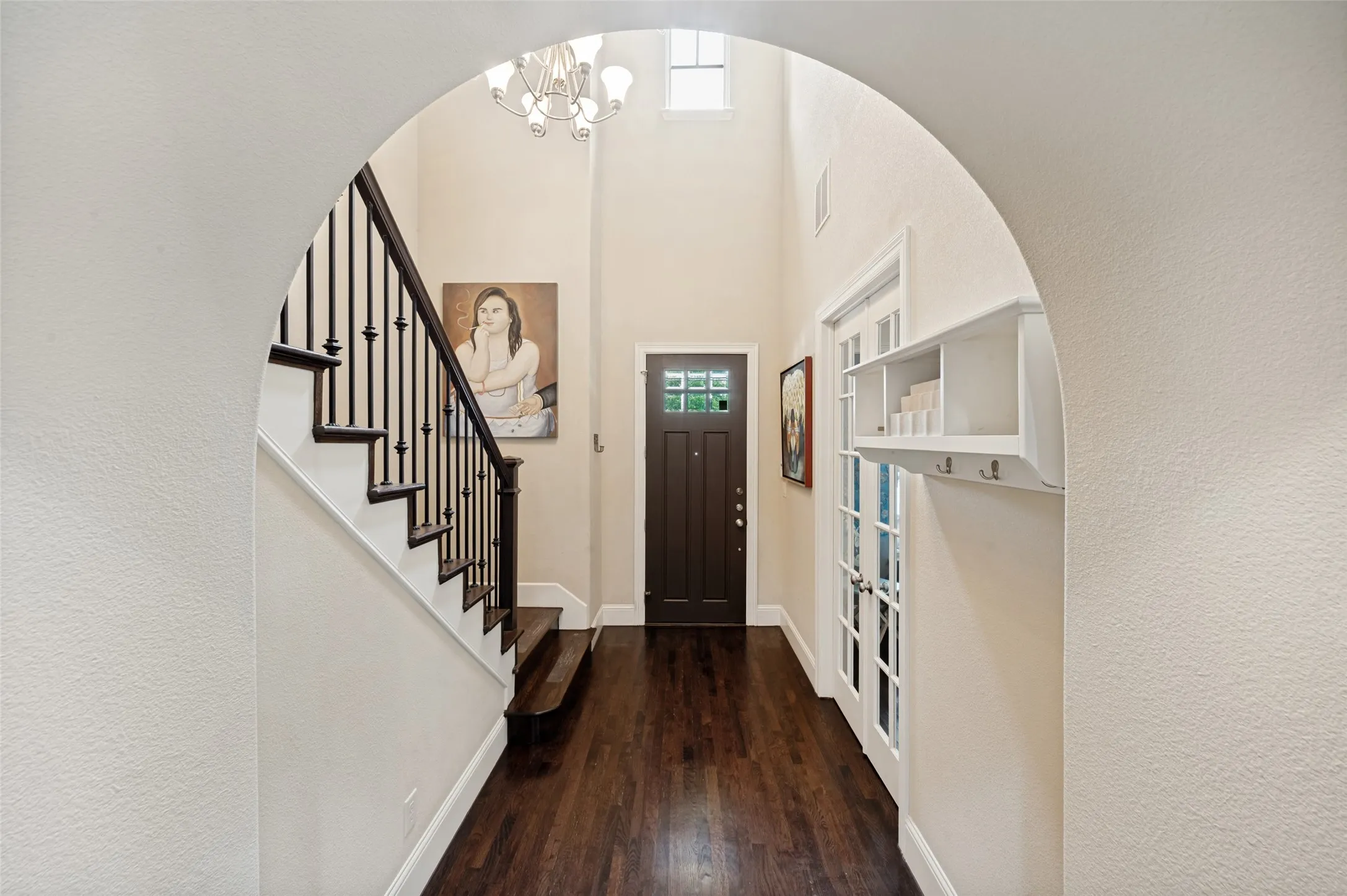 Arched entry leading to the second floor.