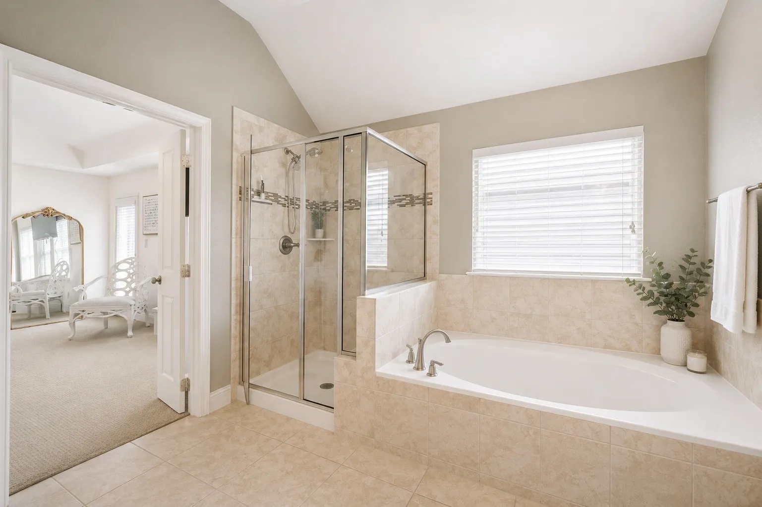 Primary bath with separate tub and shower.