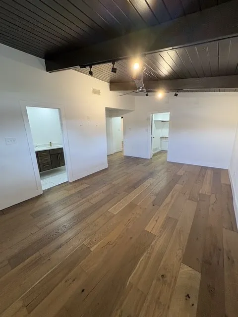 Primary bedroom with walk-in closet.