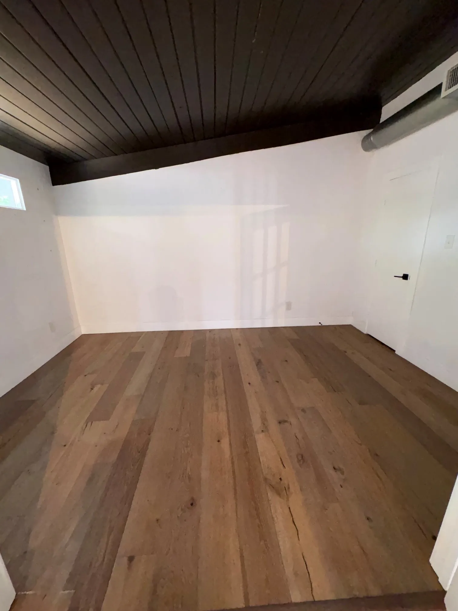 Third bedroom with walk-in closet. Can be used as an office, study, exercise room. French doors open to living area.
