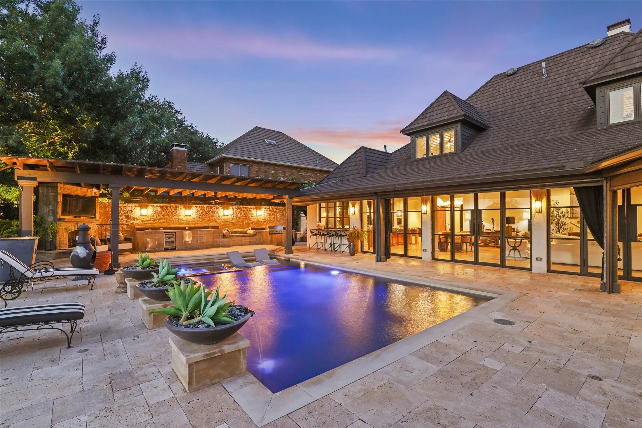 Resort-style pool transforms the backyard into a private retreat for relaxing and entertaining.