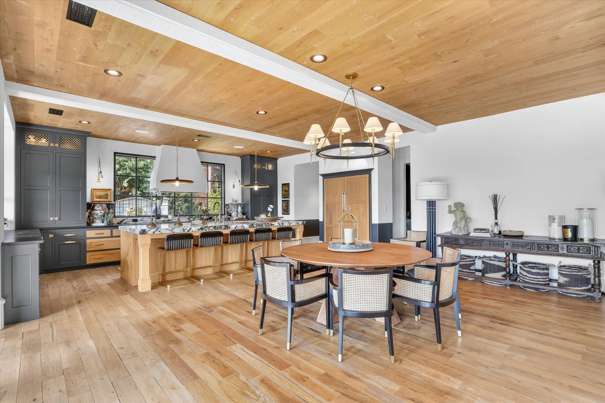 Generously scaled dining area flows effortlessly between the kitchen and family room.