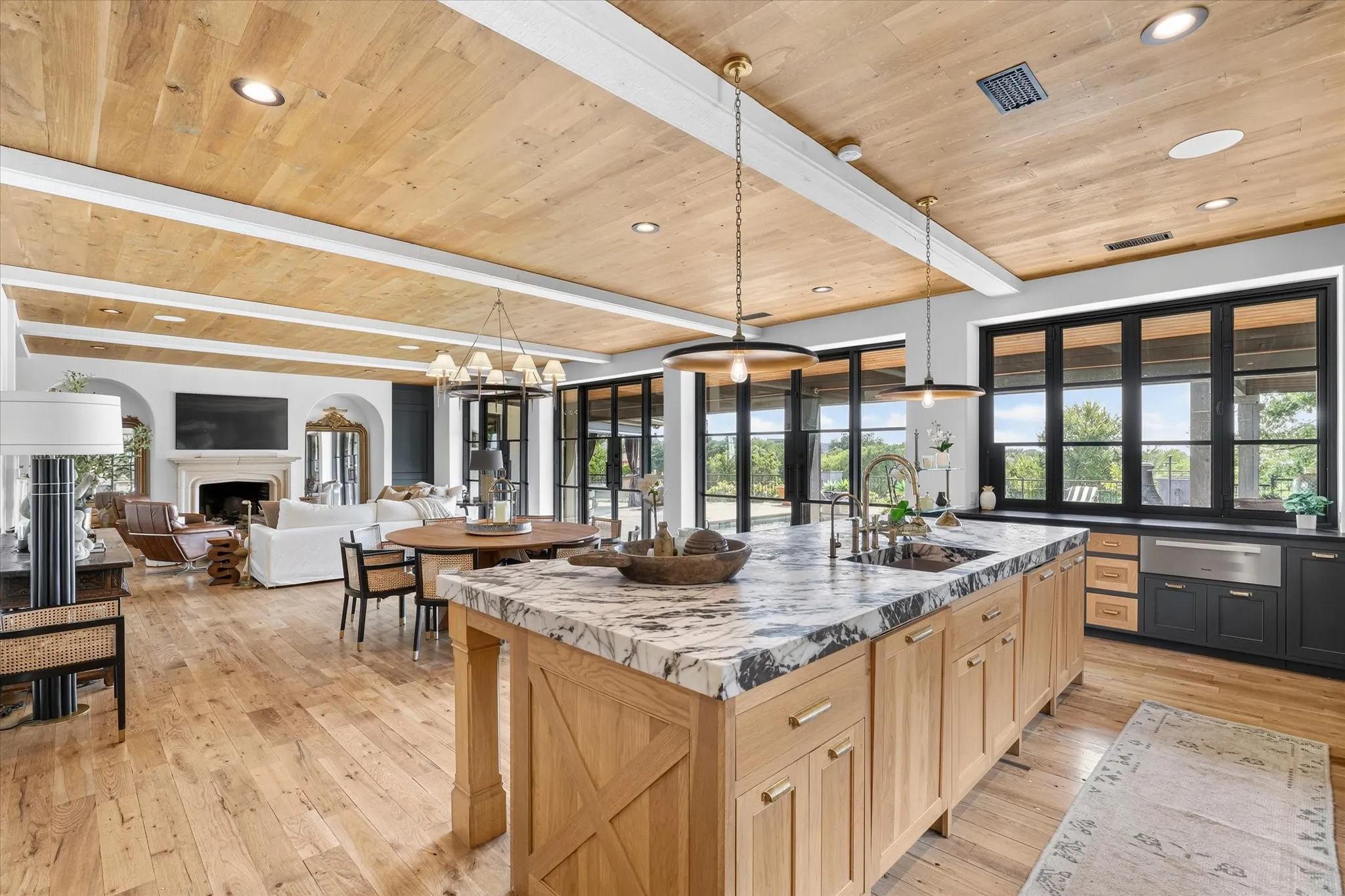 Designed to be as beautiful as it is functional, the kitchen opens directly to the home’s expansive living and dining spaces.