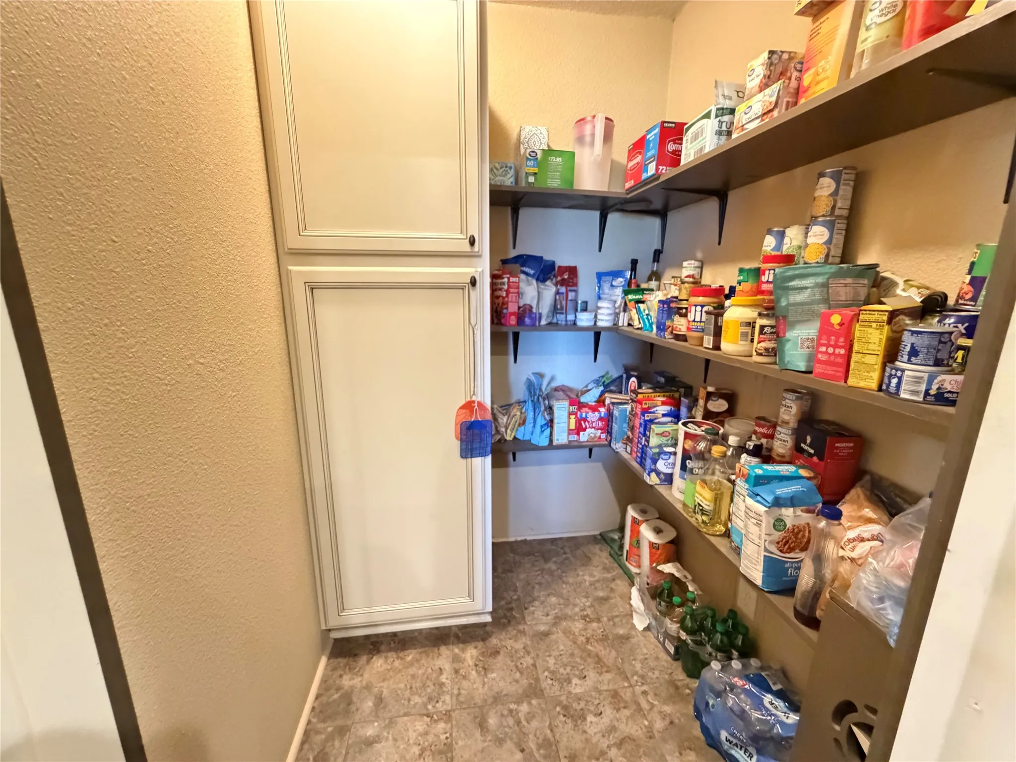 Built-in shelving and cabinetry for ample storage