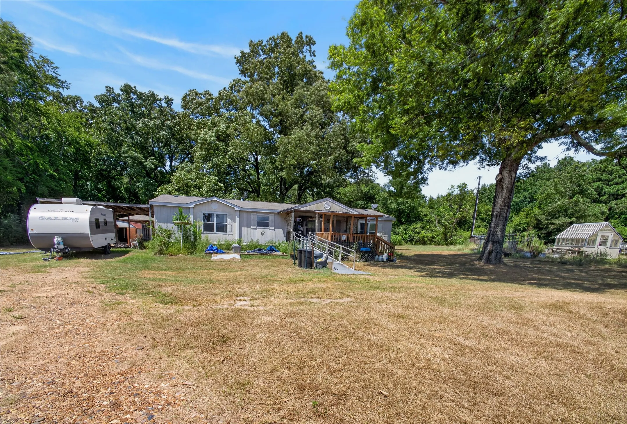 Manufactured Home For Sale in Bowie County , 350 County Road 3102, New Boston, Texas 75570, 3 Bedroom, 2 Bathroom, Garage spaces, 1,642 Sqft, built in 2002, mls#21355731, Real Estate Agent in New Boston, Homes For Sale in Bowie county, Homes For Sale in New Boston, Realtor in New Boston Texas, Real Estate Brokerage Independent Realty Texas, Luminita Cordes Realtor
