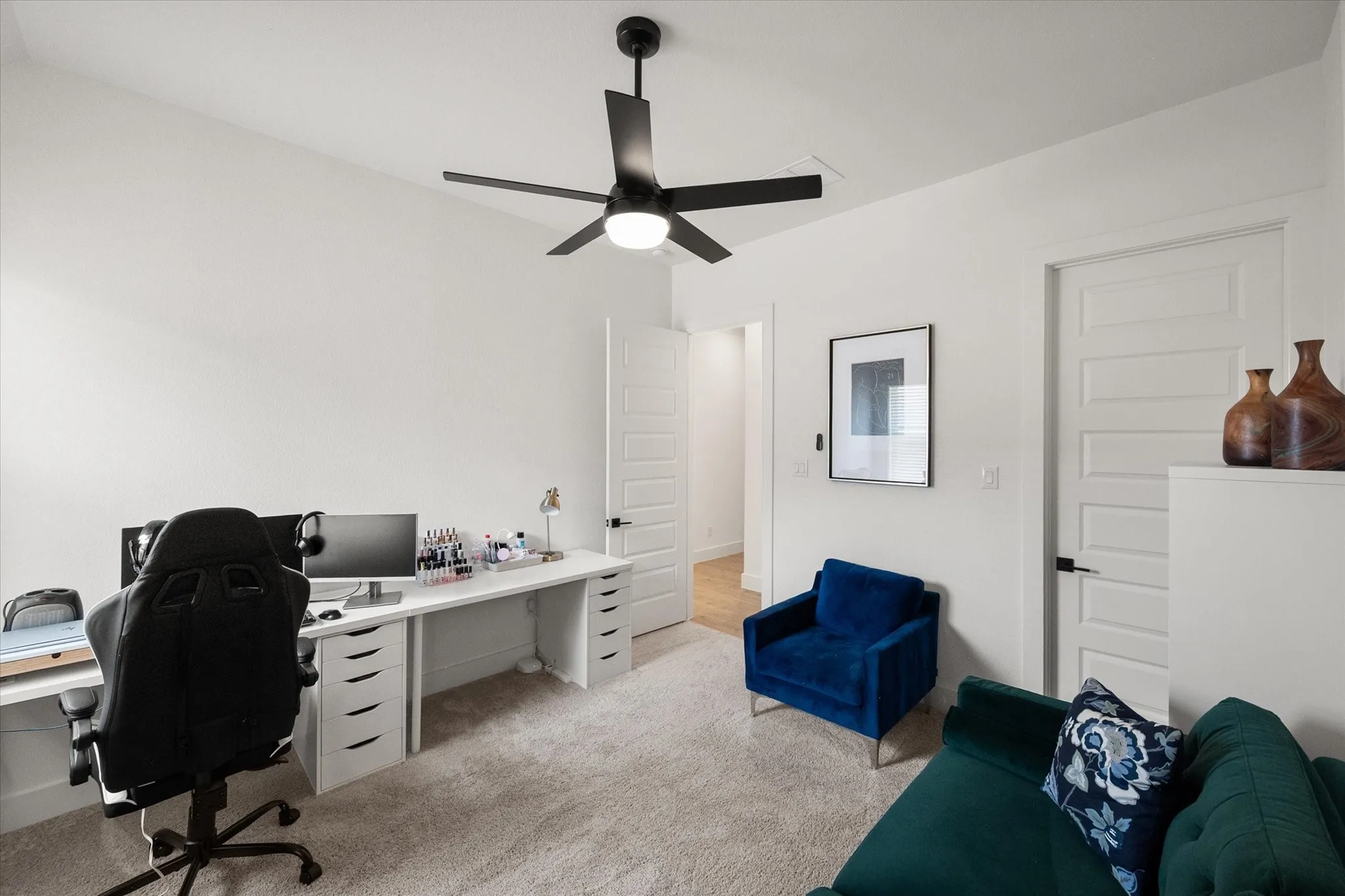 This room is set up as a second office and has its own bathroom and walk in closet.