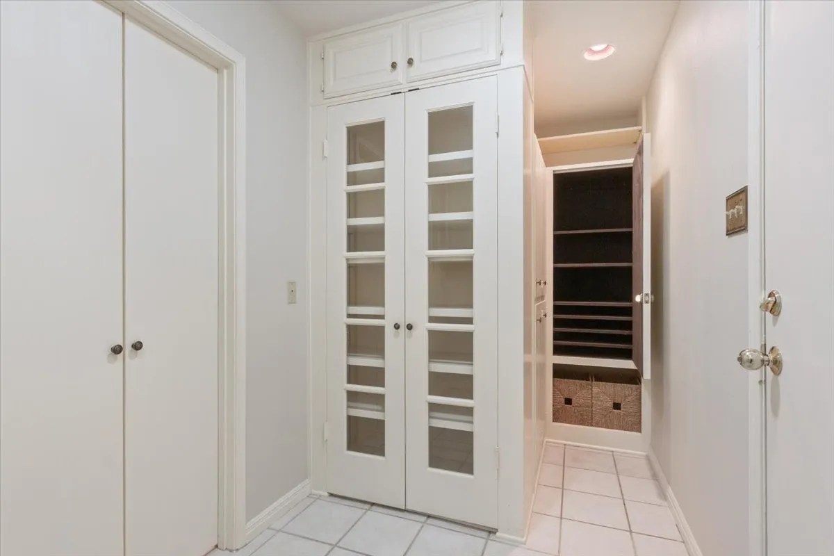 Pantry, laundry and silver storage closet off of the eat-in kitchen