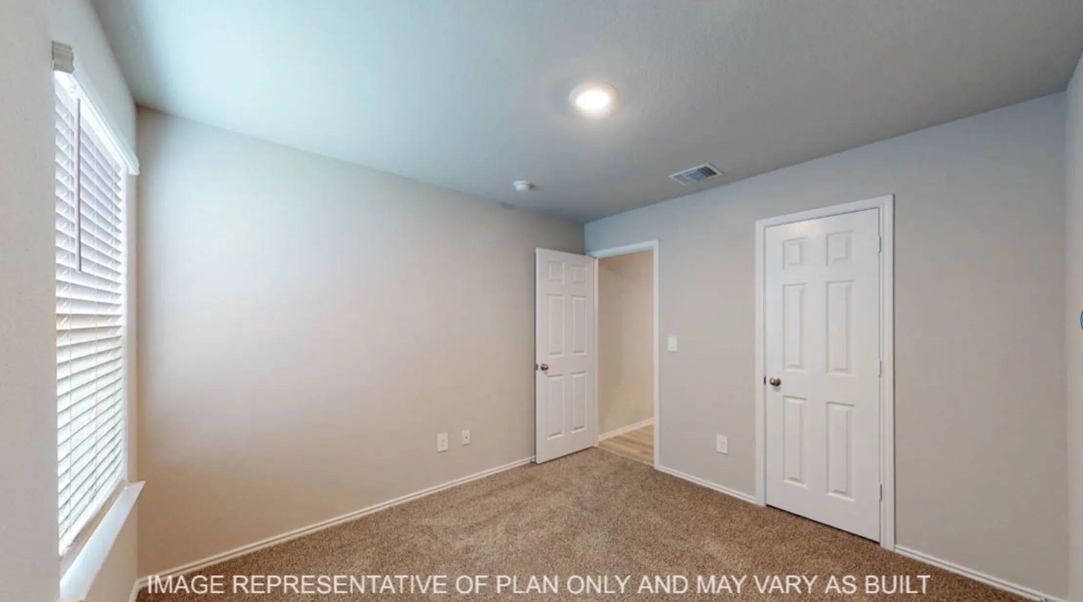 Neutral wall color, recessed lighting, window with blinds, paneled interior doors, and carpet flooring