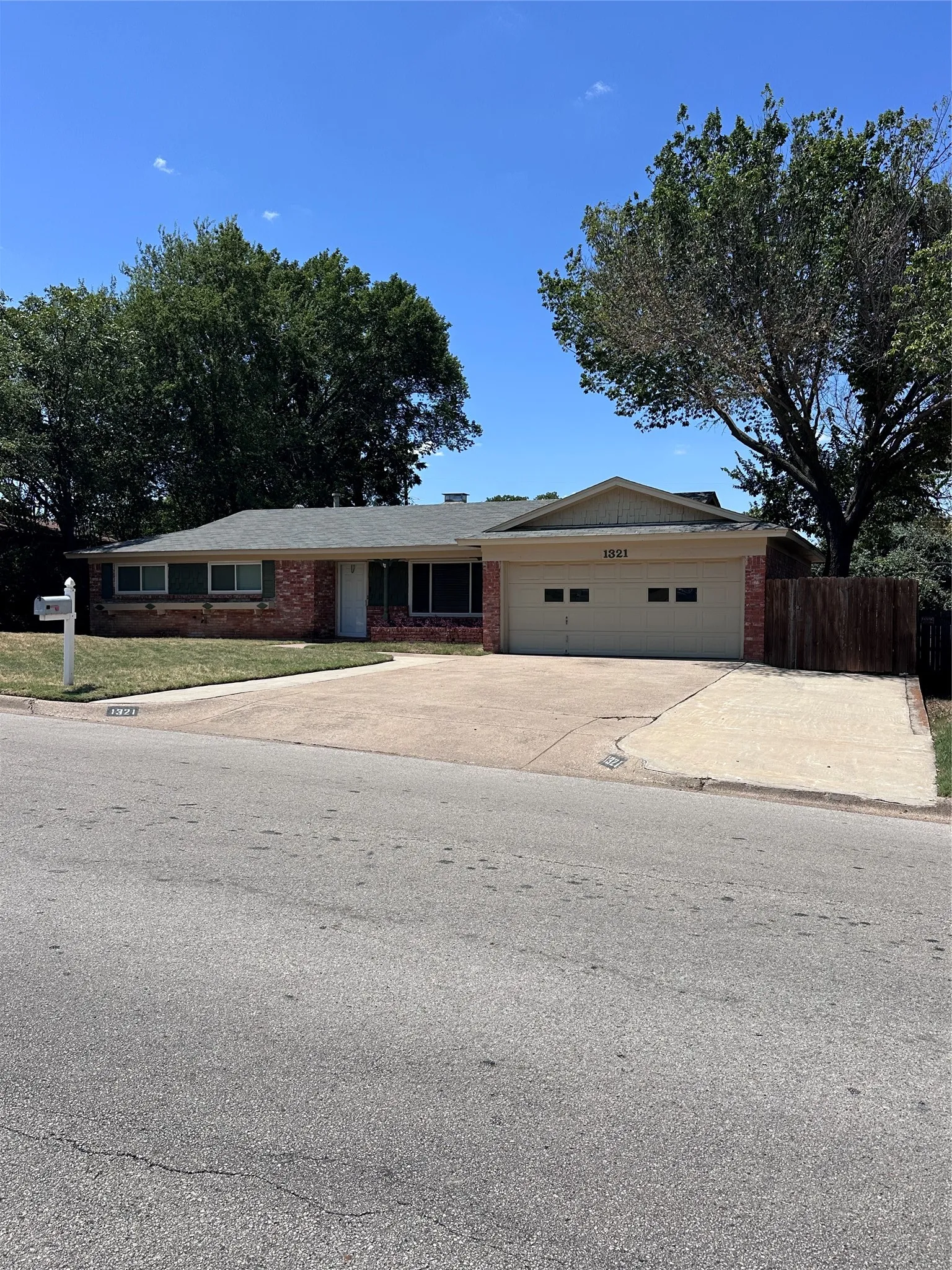 Brick facade with a two-car garage