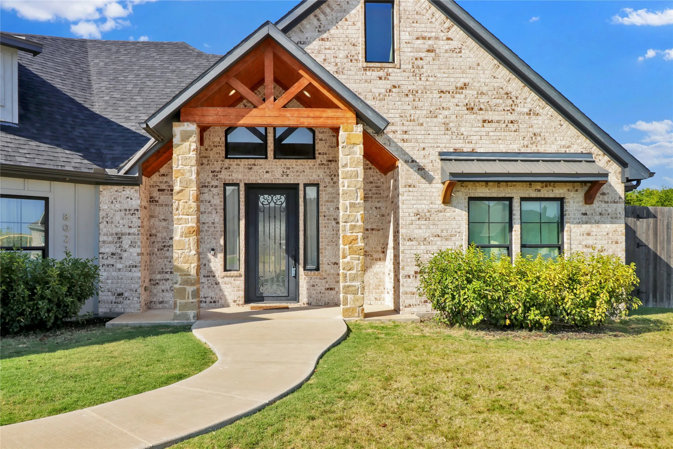 Decorative covered front porch.
