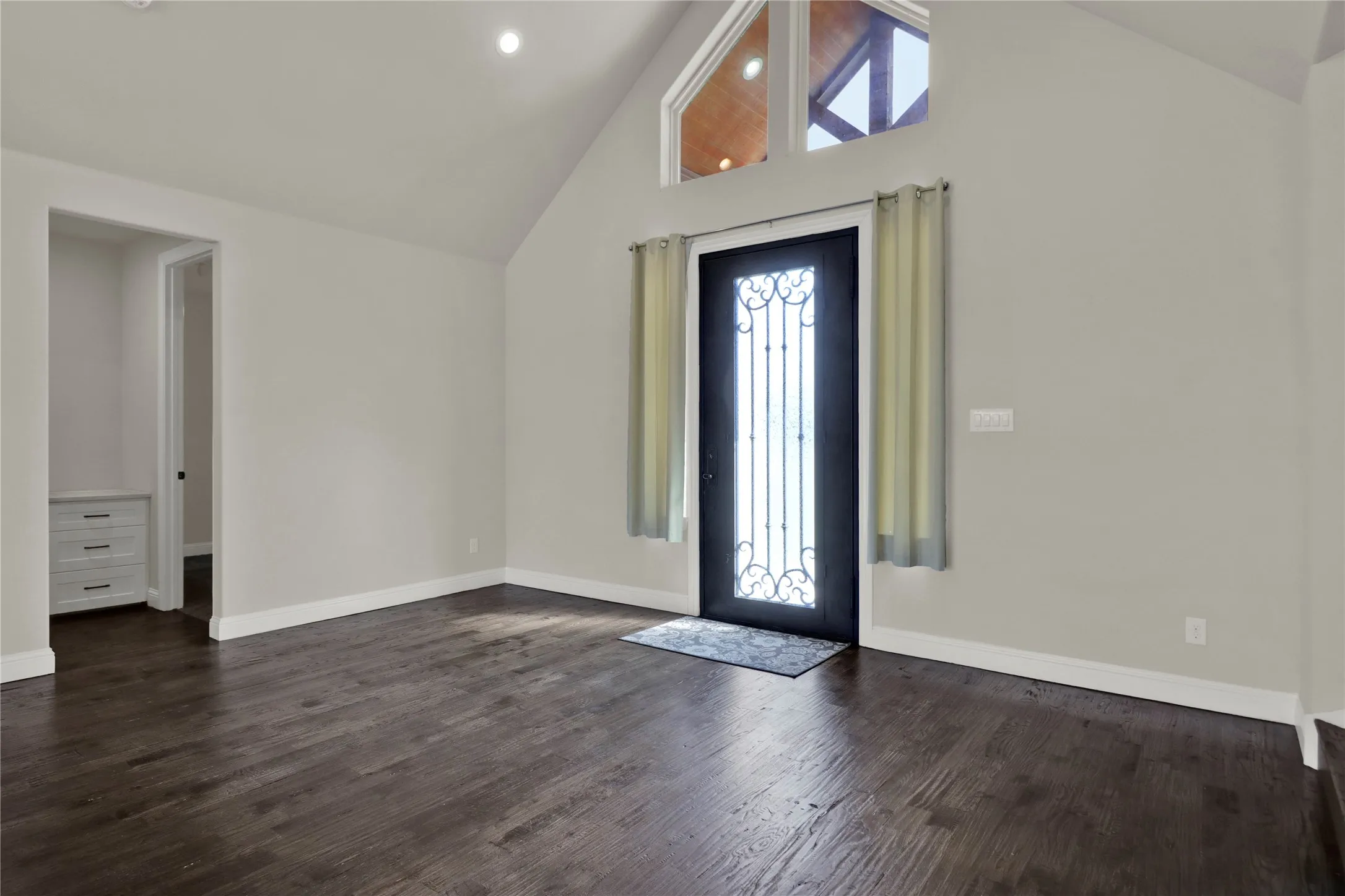 Entry with beautiful door and windows for natural light.