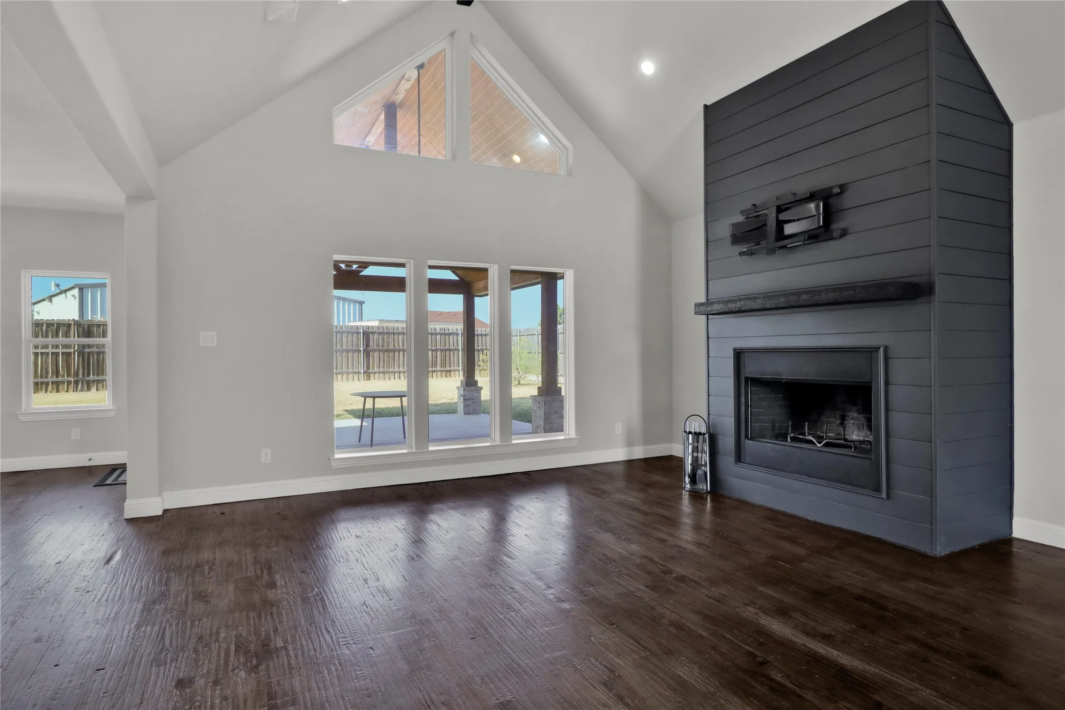 Fireplace with space for tv and decorative mantle