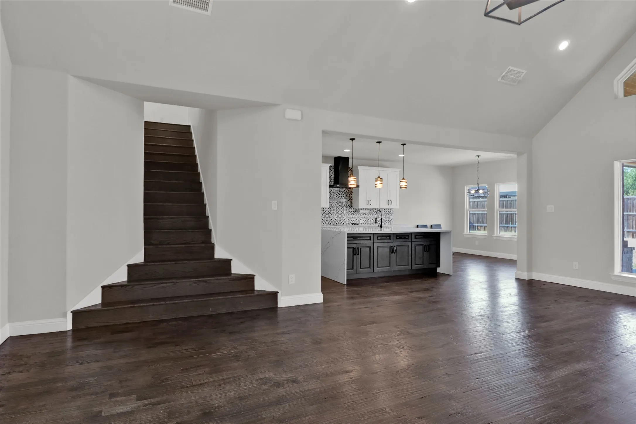 Living room opens to kitchen and dining.