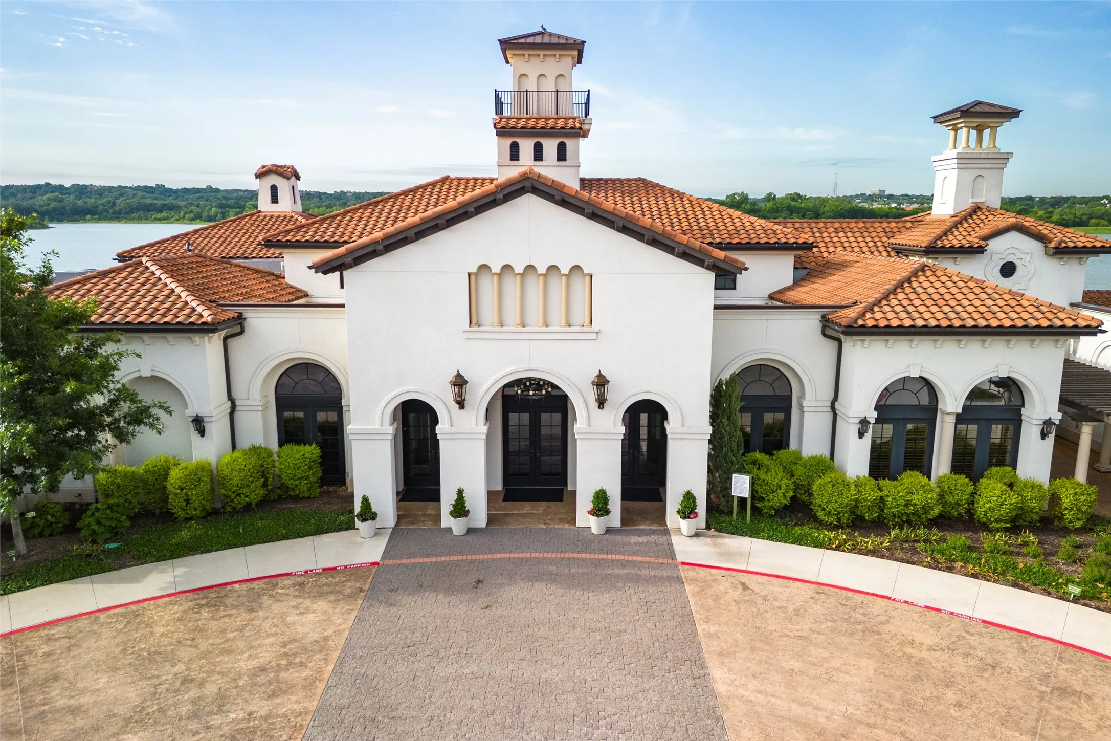 Viridian Events Center — Elegant community events center featuring expansive outdoor patios, inviting firepit gathering areas and breathtaking lake views. A premier Viridian amenity designed for entertaining, social events and enjoying the scenic waterfront setting within this sought-after master-planned community.