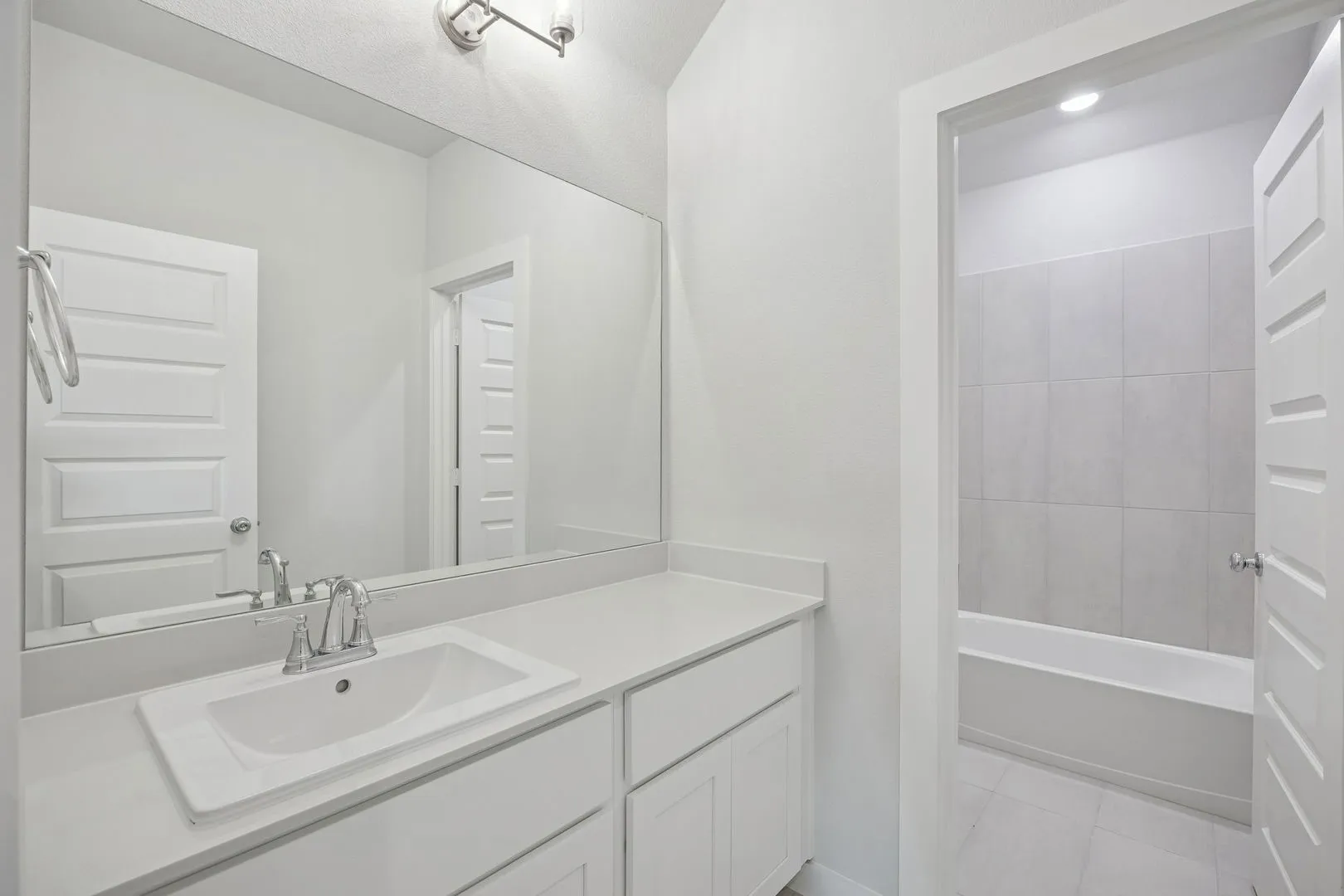 Bathroom in the Masters home plan by Trophy Signature Homes – REPRESENTATIVE PHOTO