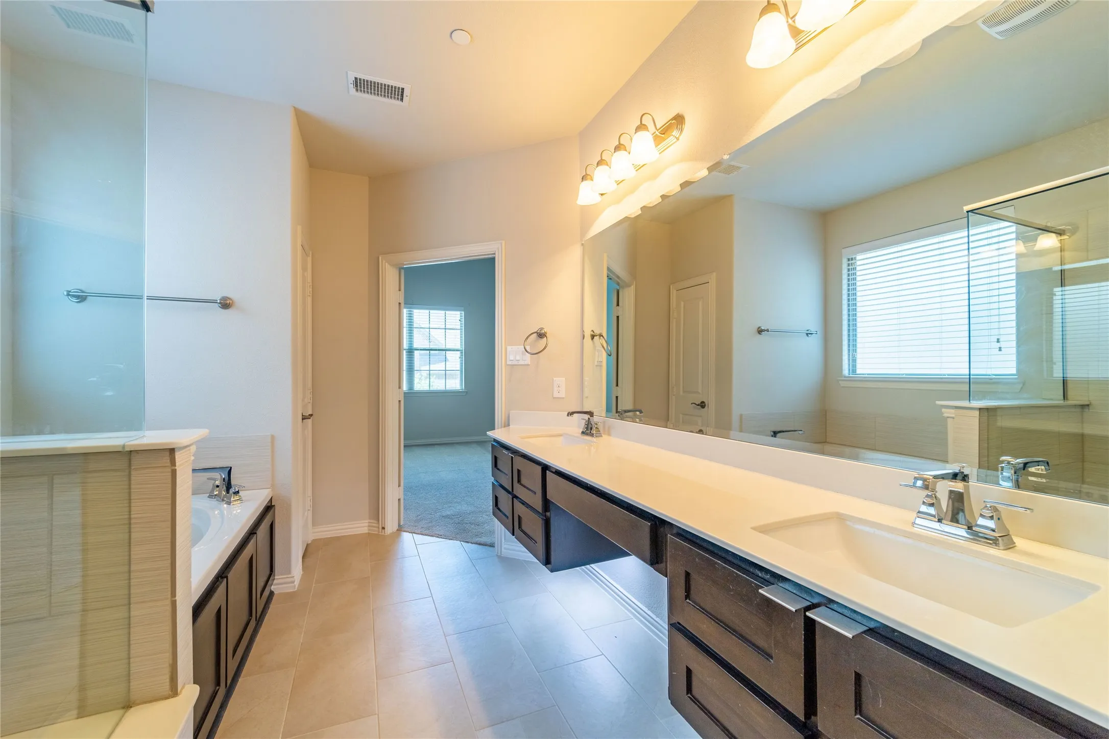 Dual sinks and makeup vanity
