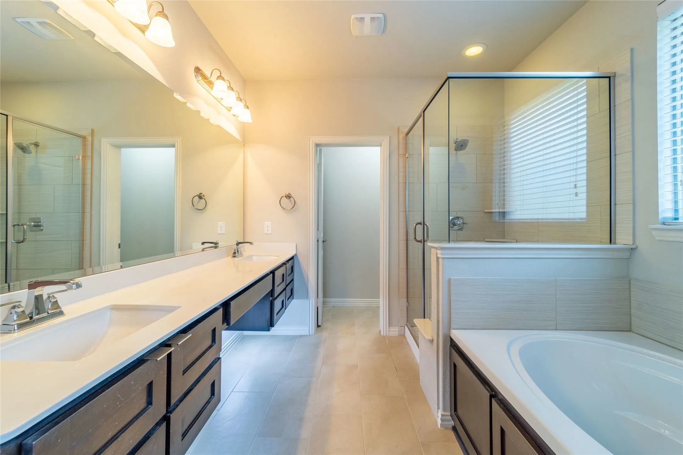 Under counter lighting adds to the atmosphere of this relaxing space - you'll feel like you're in a spa