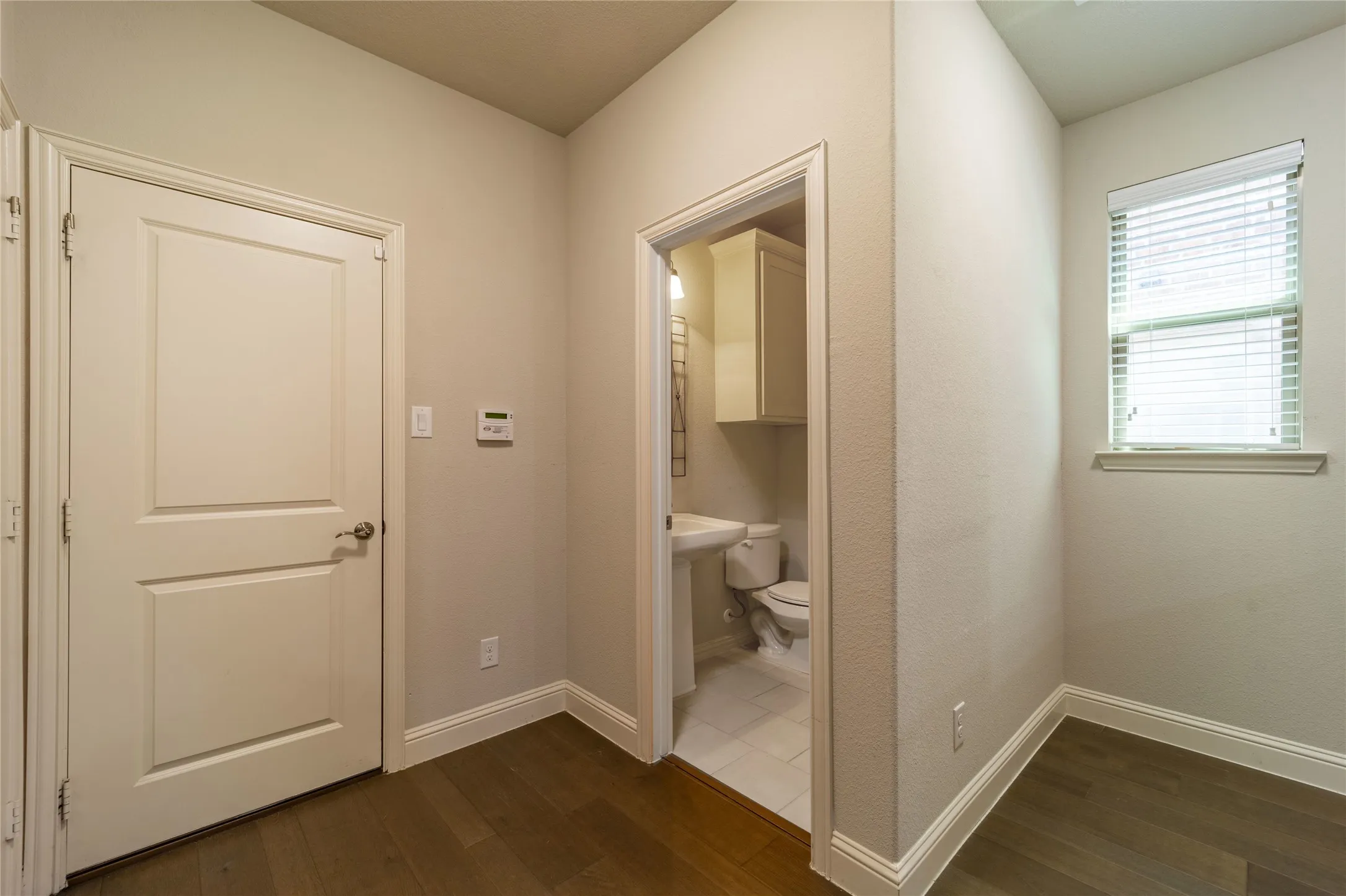 Half bath located conveniently near the main living spaces