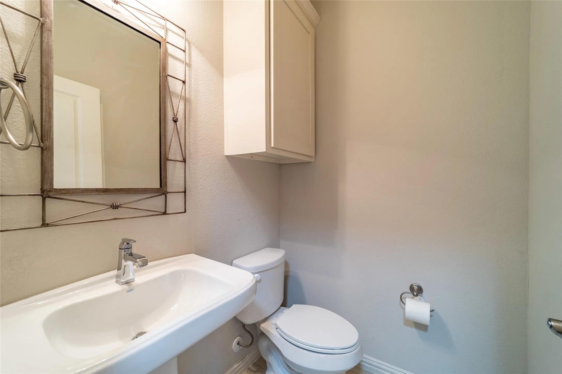 Tall cabinets in the half bath