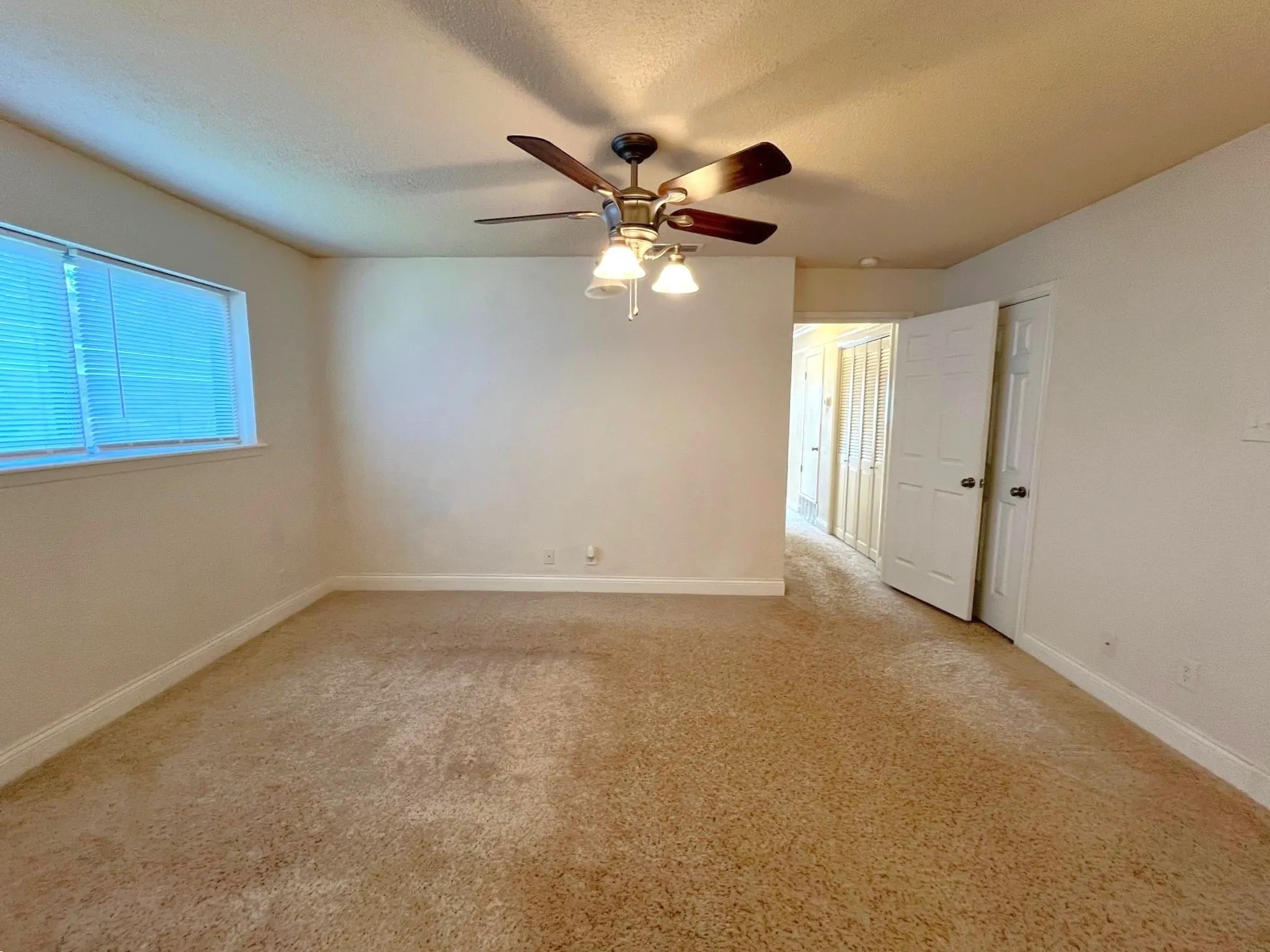 Primary Bedroom with ensuite bath and fan