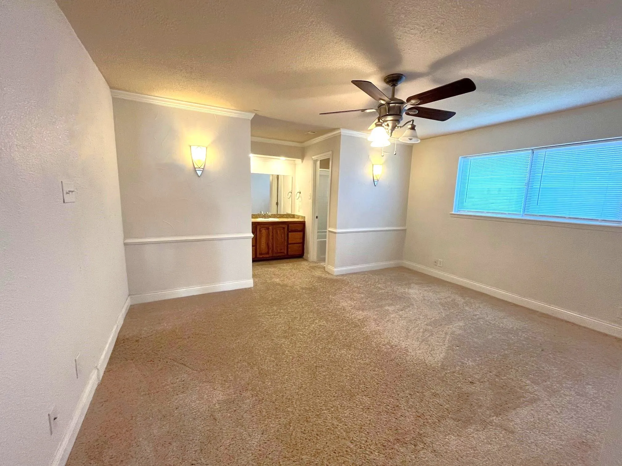Primary Bedroom with ensuite bath and fan