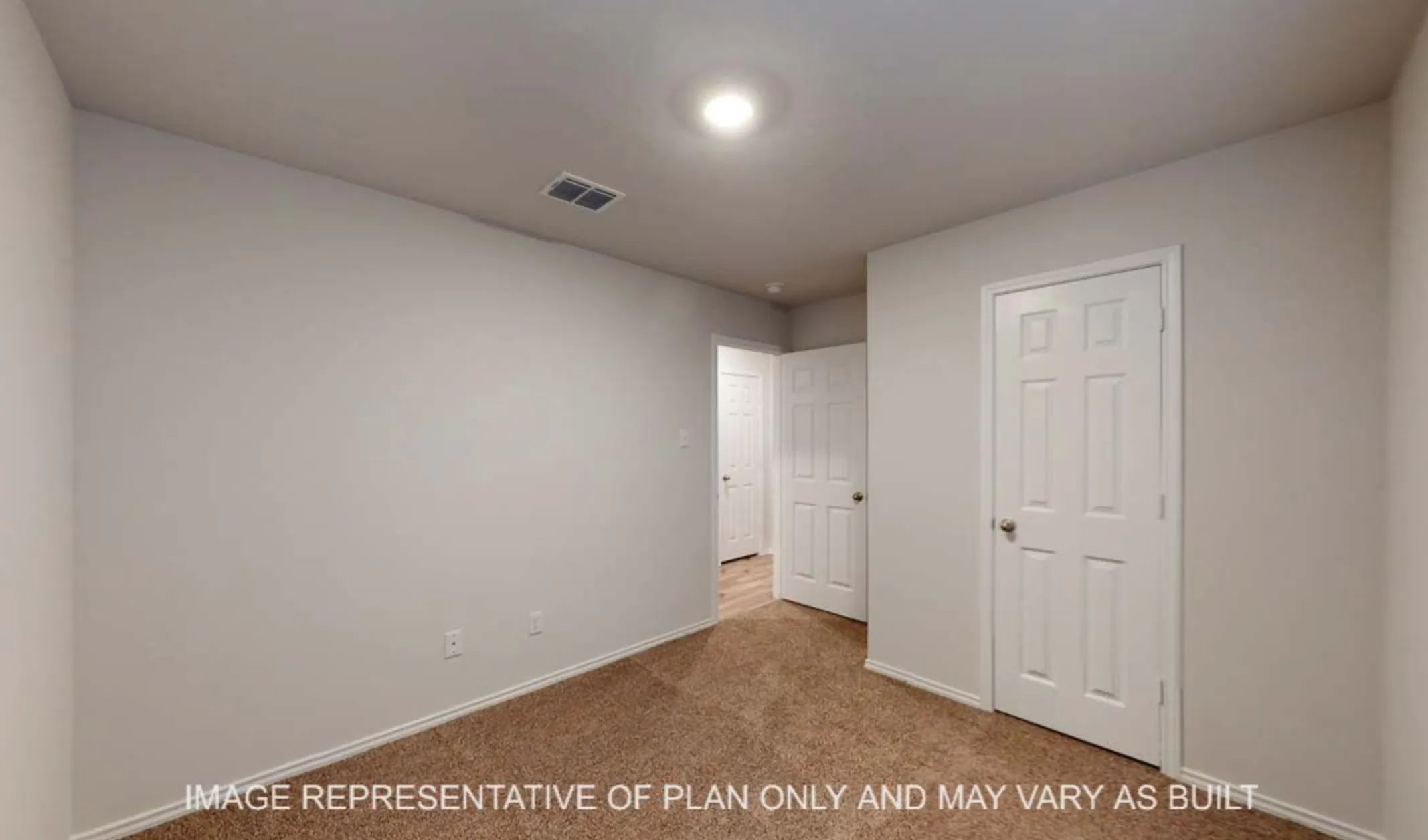 Neutral wall finishes, carpet flooring, recessed lighting, and panel doors