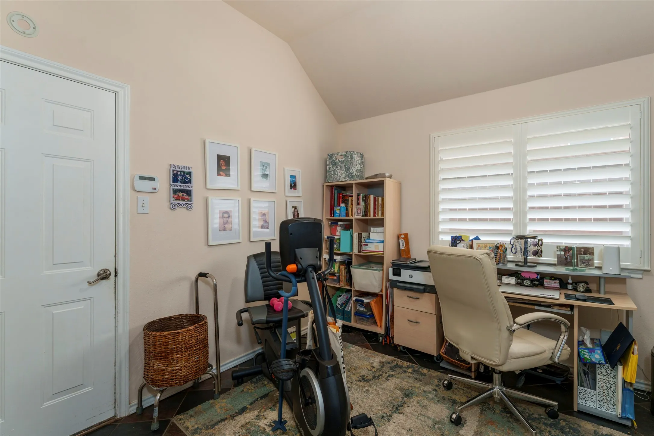 Utility room is large enough to include a desk