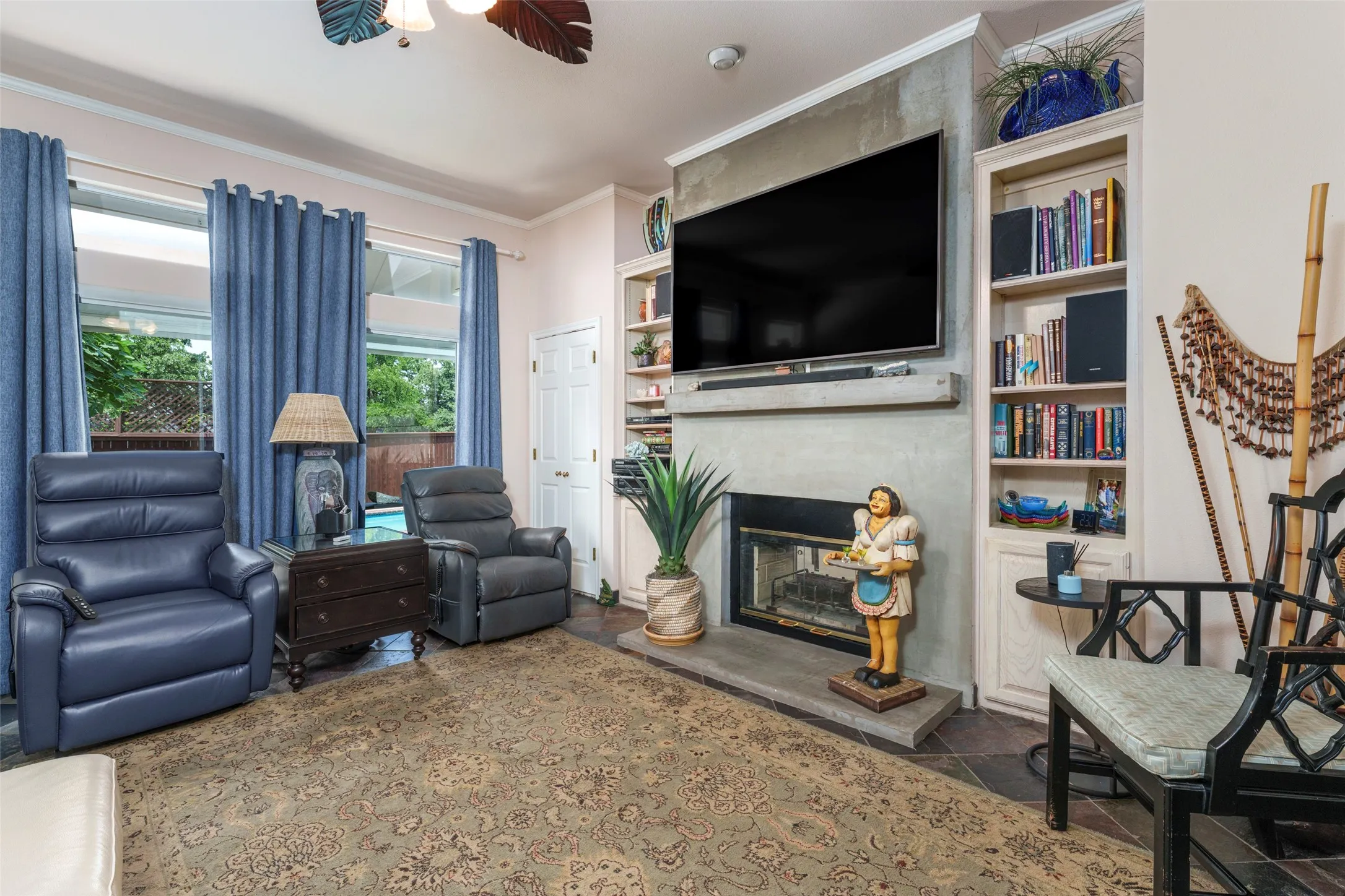 Family room looking out over the pool and backyard