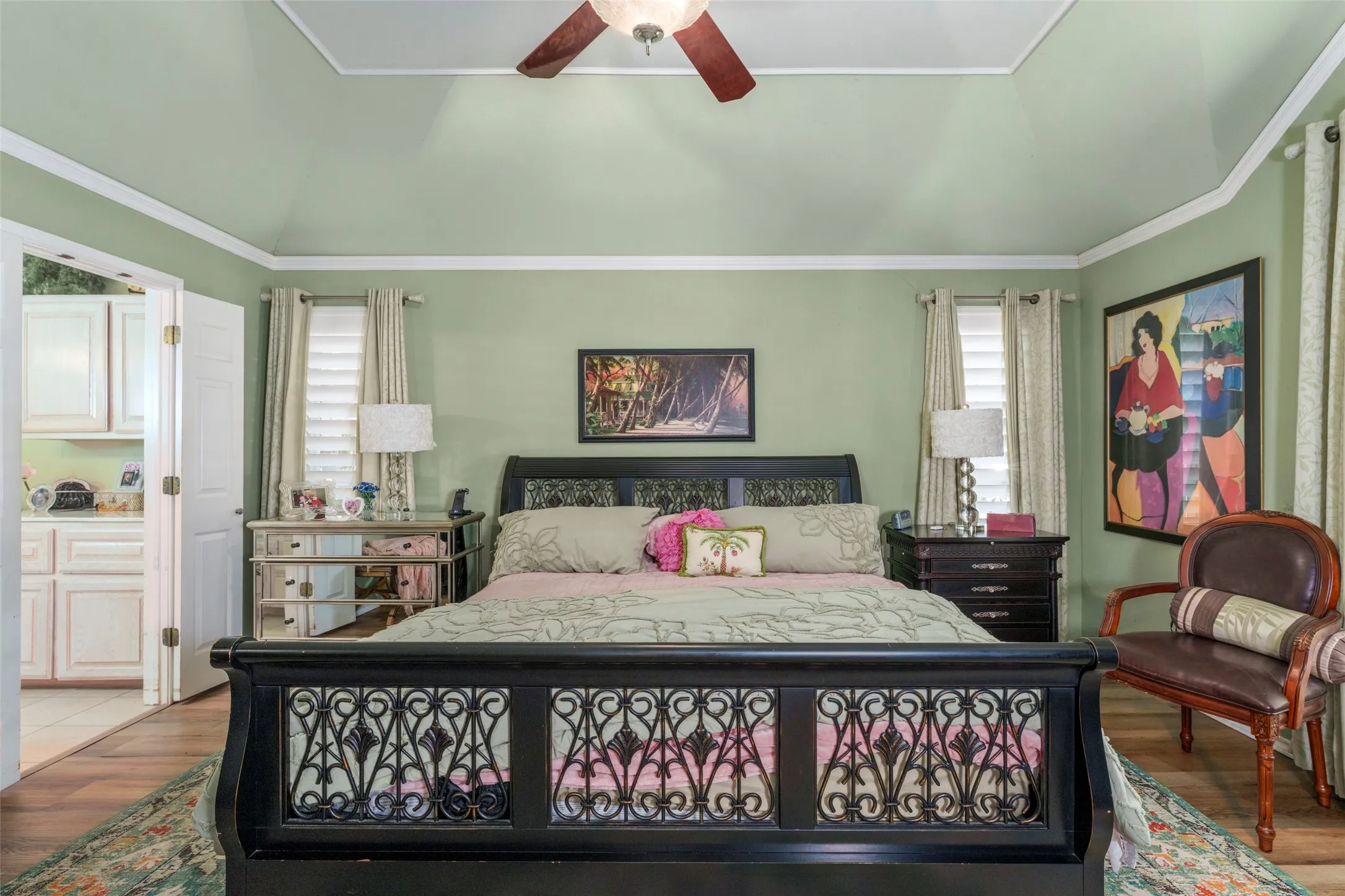 Primary bedroom is plenty large for king sized bed and night stands