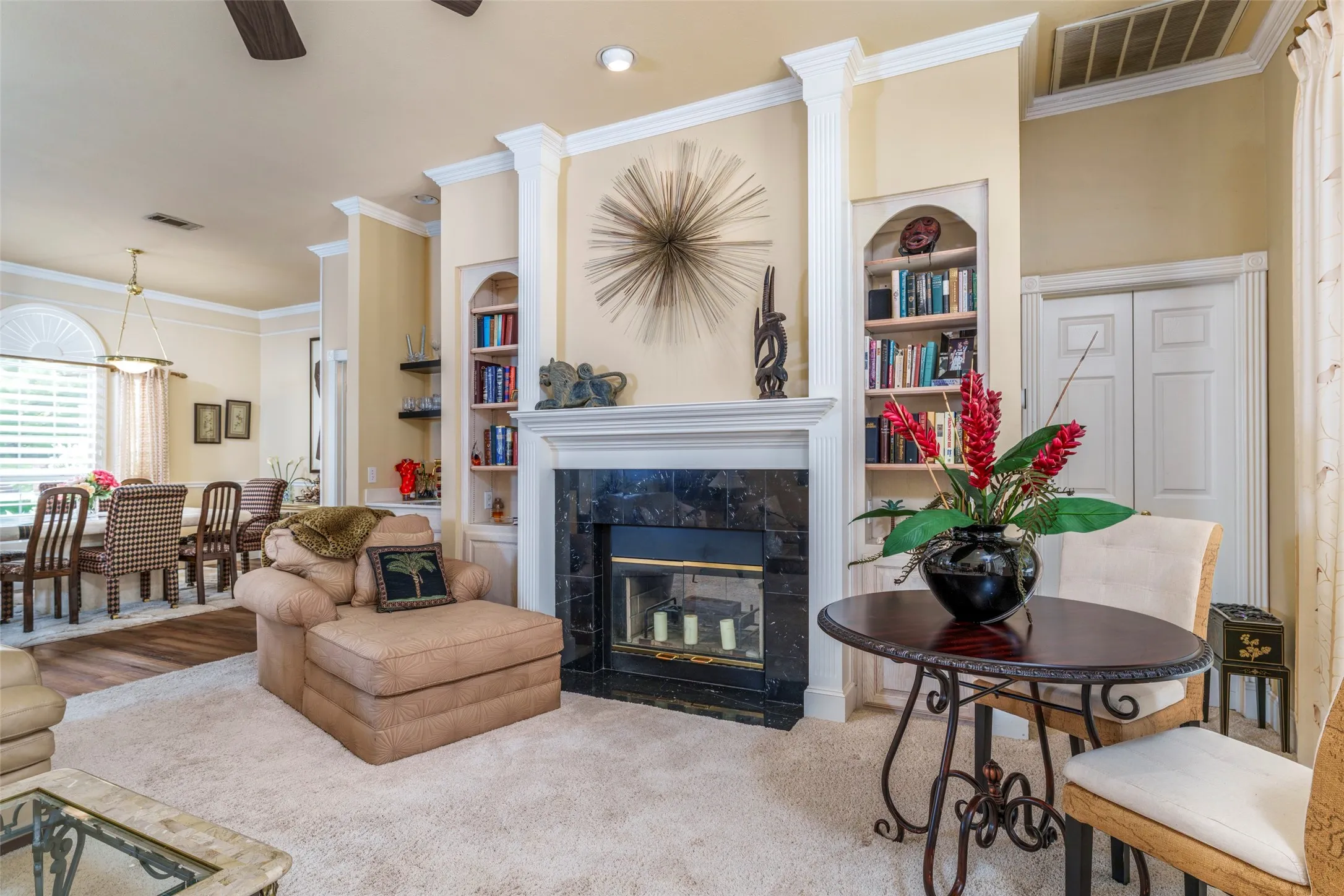 See through fireplace services both the living room and family room