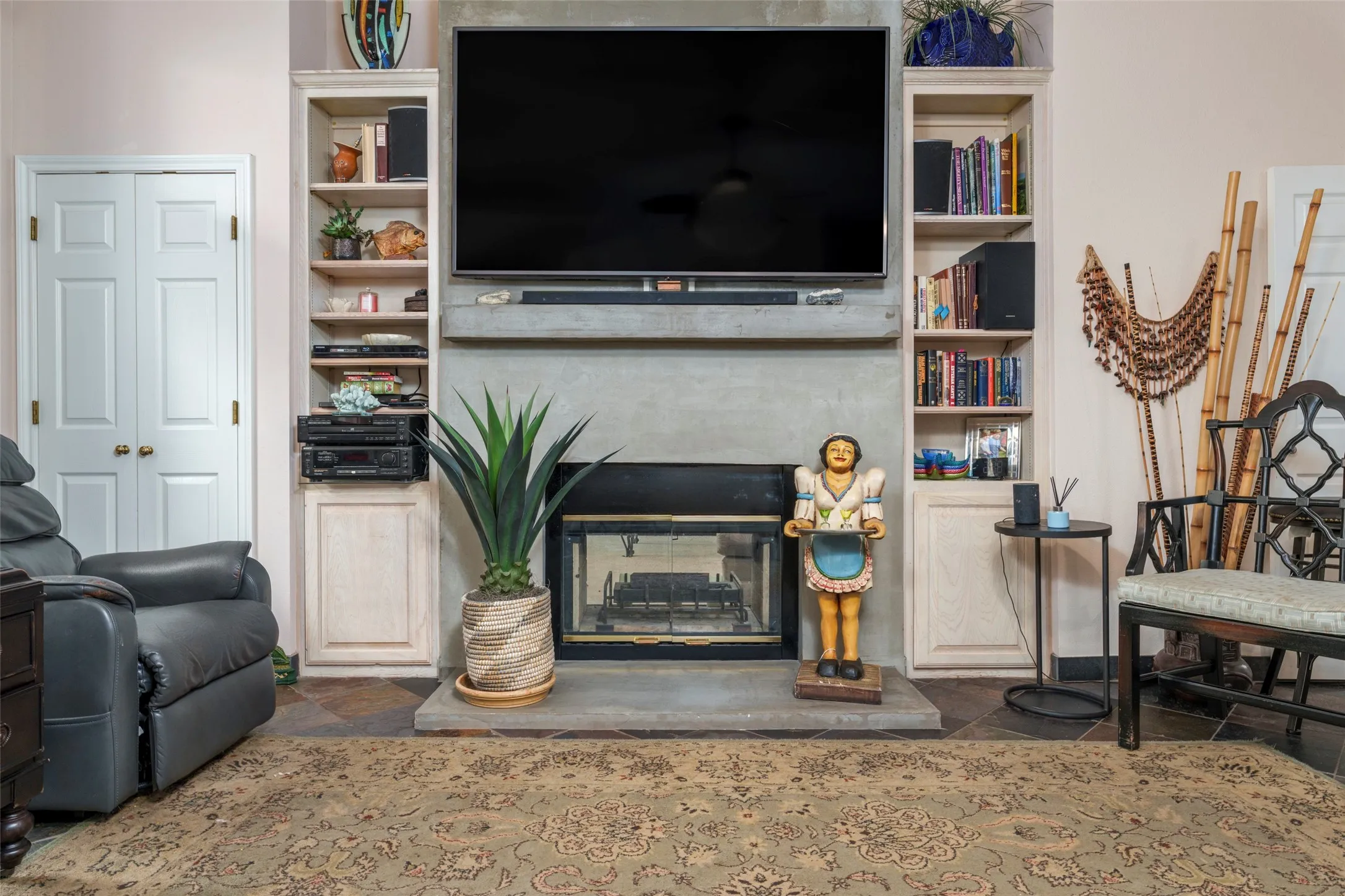 See through fireplace and bookshelves