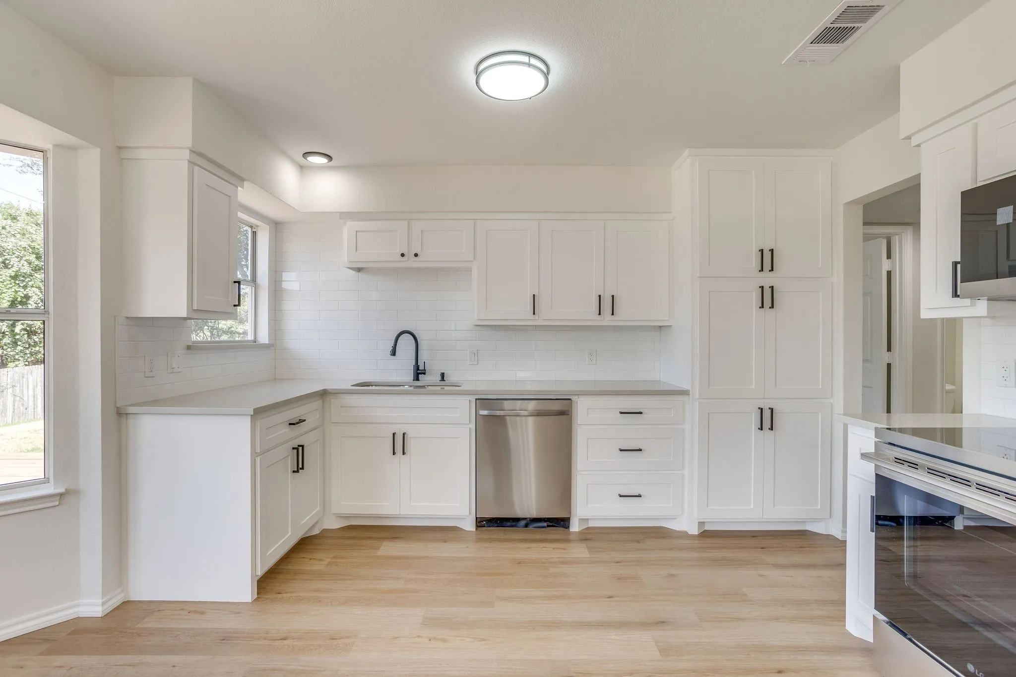 New cabinets, New Granite, New flooring and New Stainless Appliances