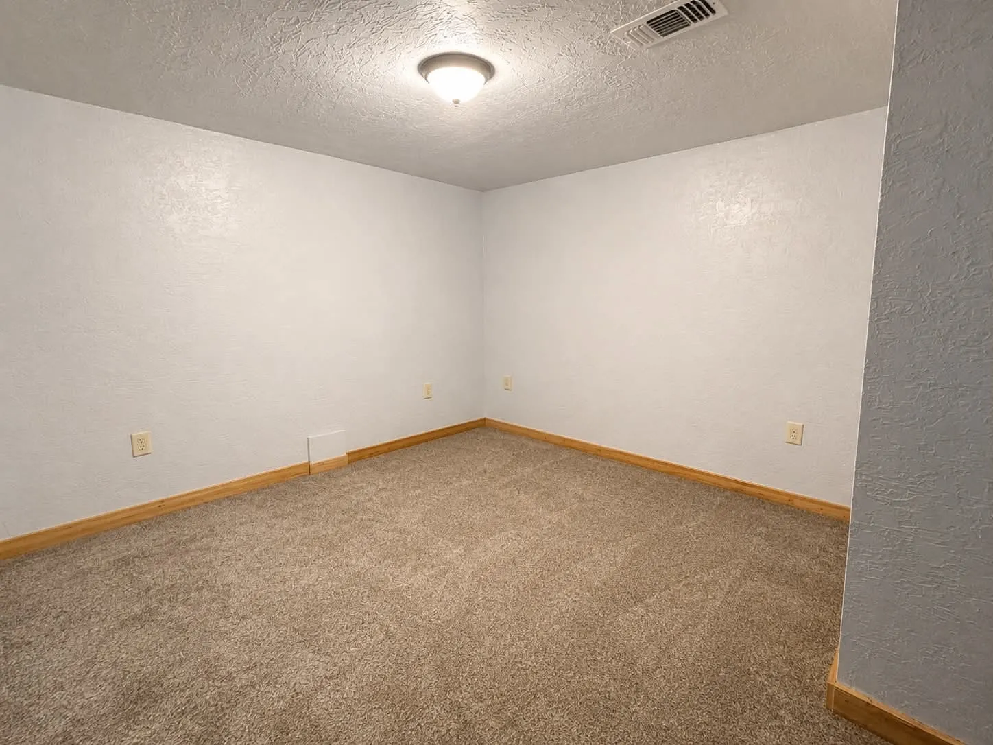 Larger bedroom in the main house