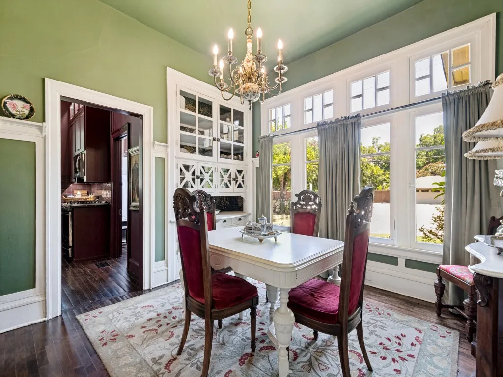 Breakfast room with built in cabinet and large windows