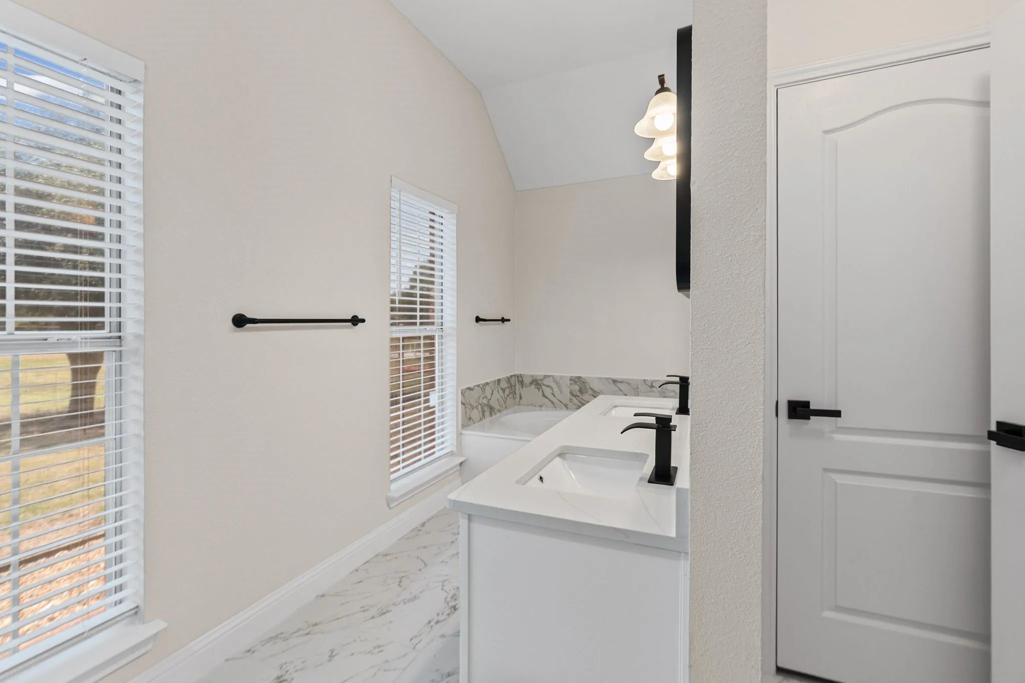 Primary bathroom with seperate shower, dual sinks, soaking tub and walk-in closet.