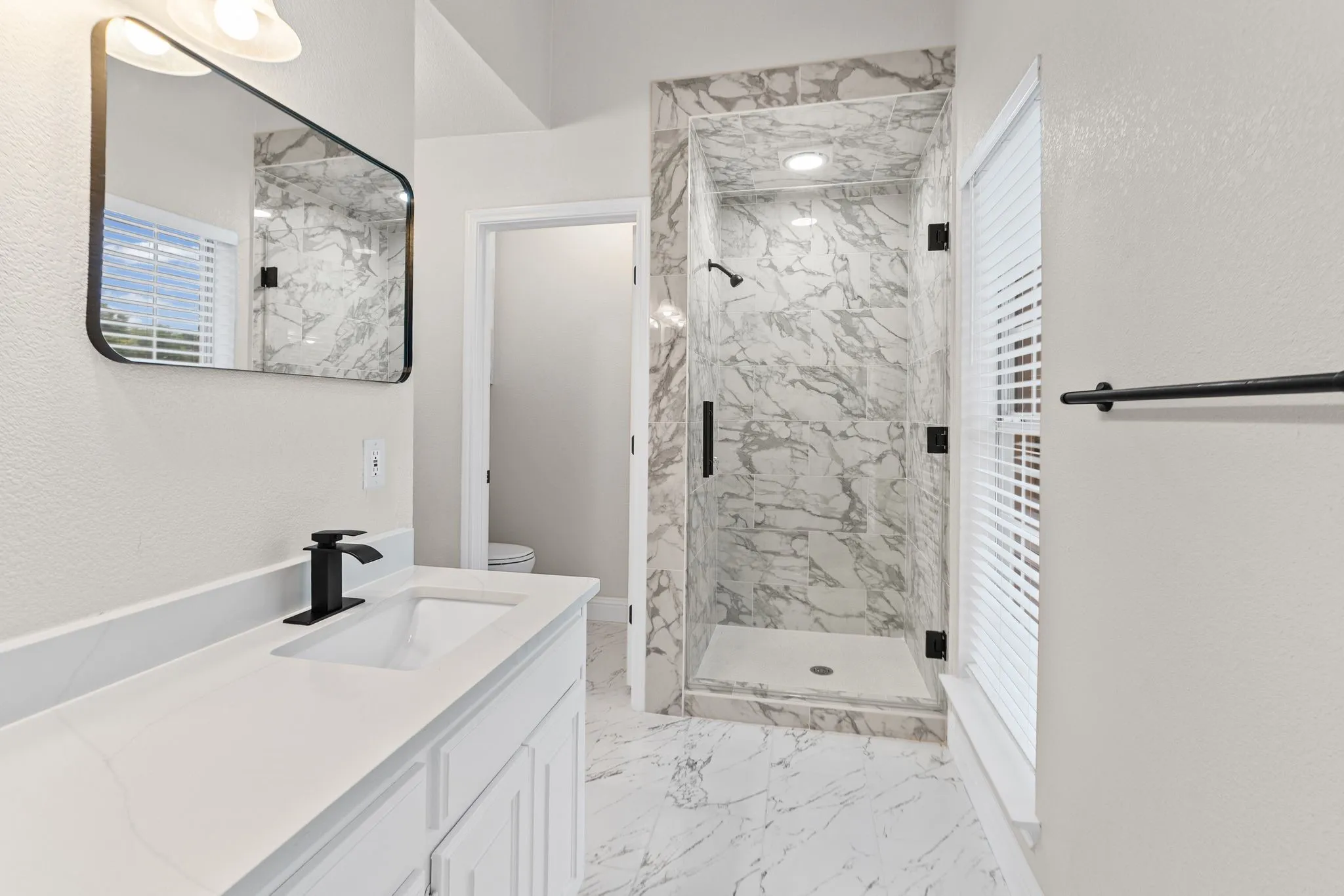 Primary bathroom with seperate shower, dual sinks, soaking tub and walk-in closet.