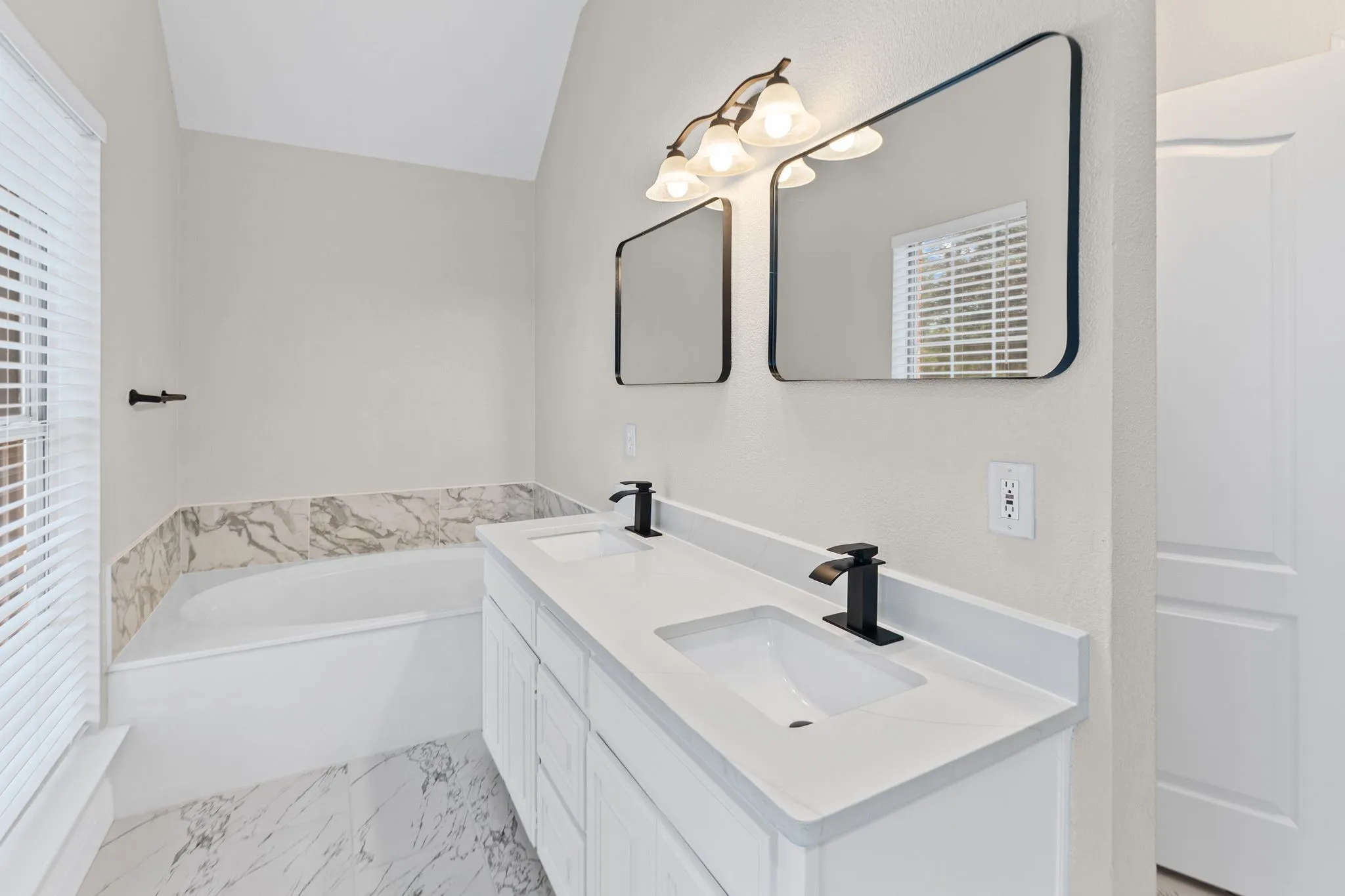 Primary bathroom with seperate shower, dual sinks, soaking tub and walk-in closet.