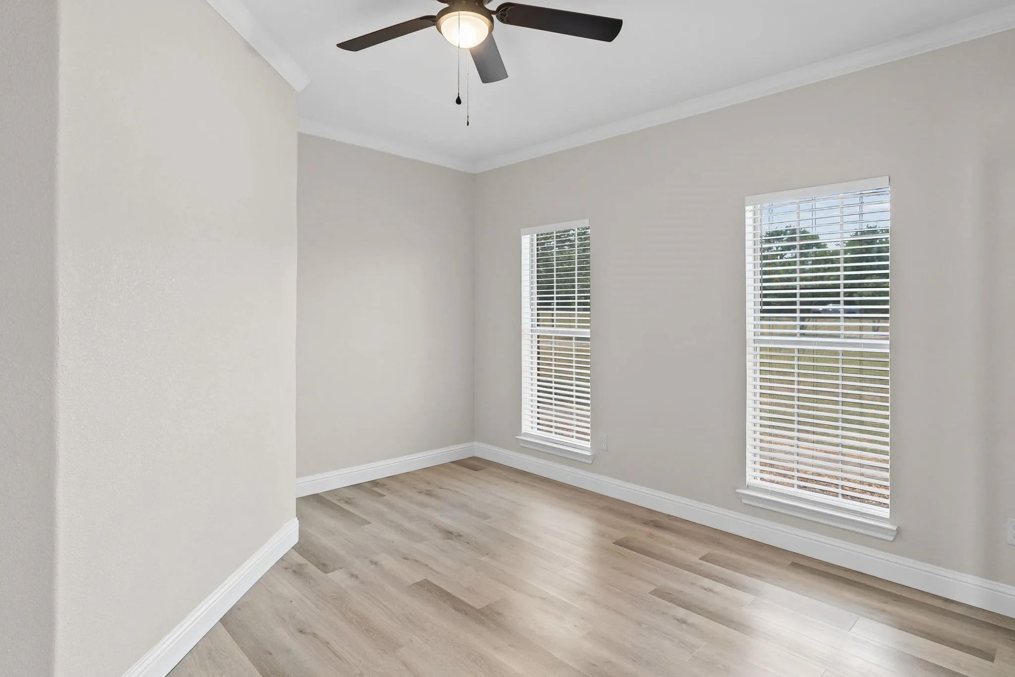 Multi-purpose room would work well as a home office, playroom, or a family room.