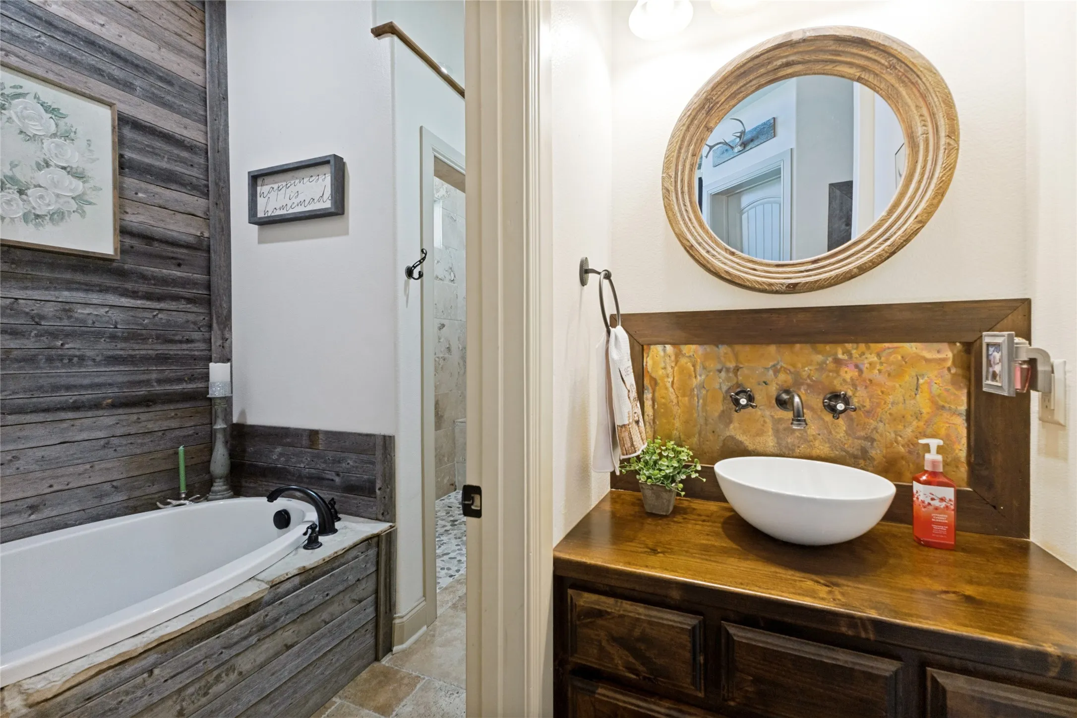 Deep soaking tub with wood-finish paneling