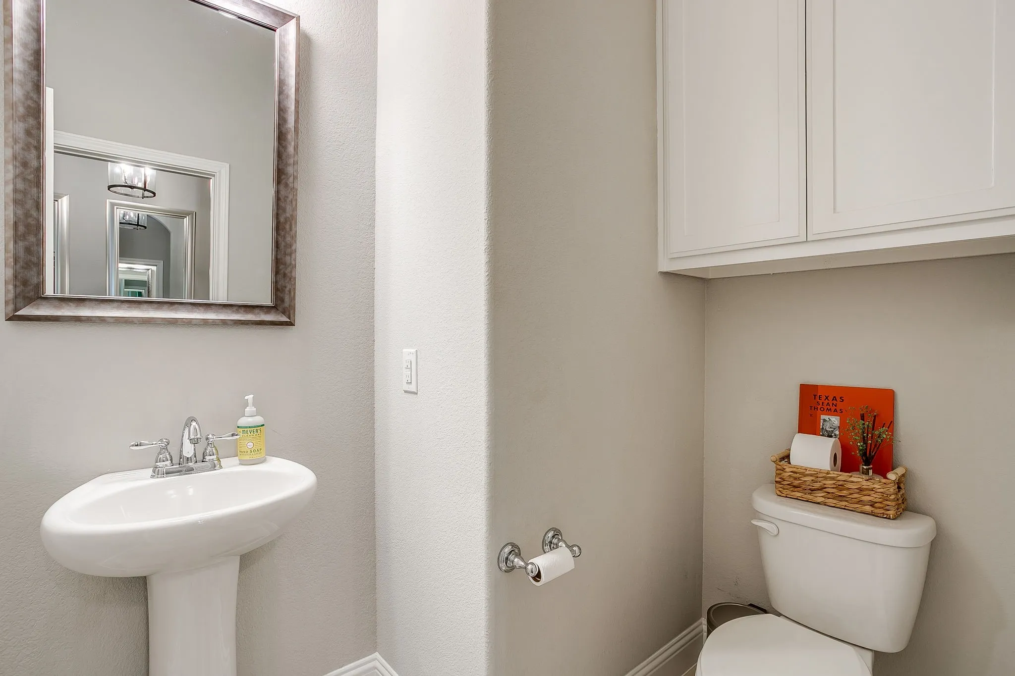 Powder bathroom off of the main hallway