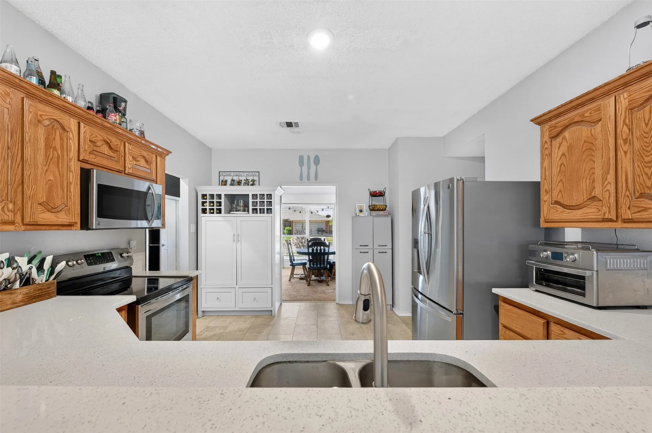Kitchen view from the breakfast  bar from adjacent to living room
