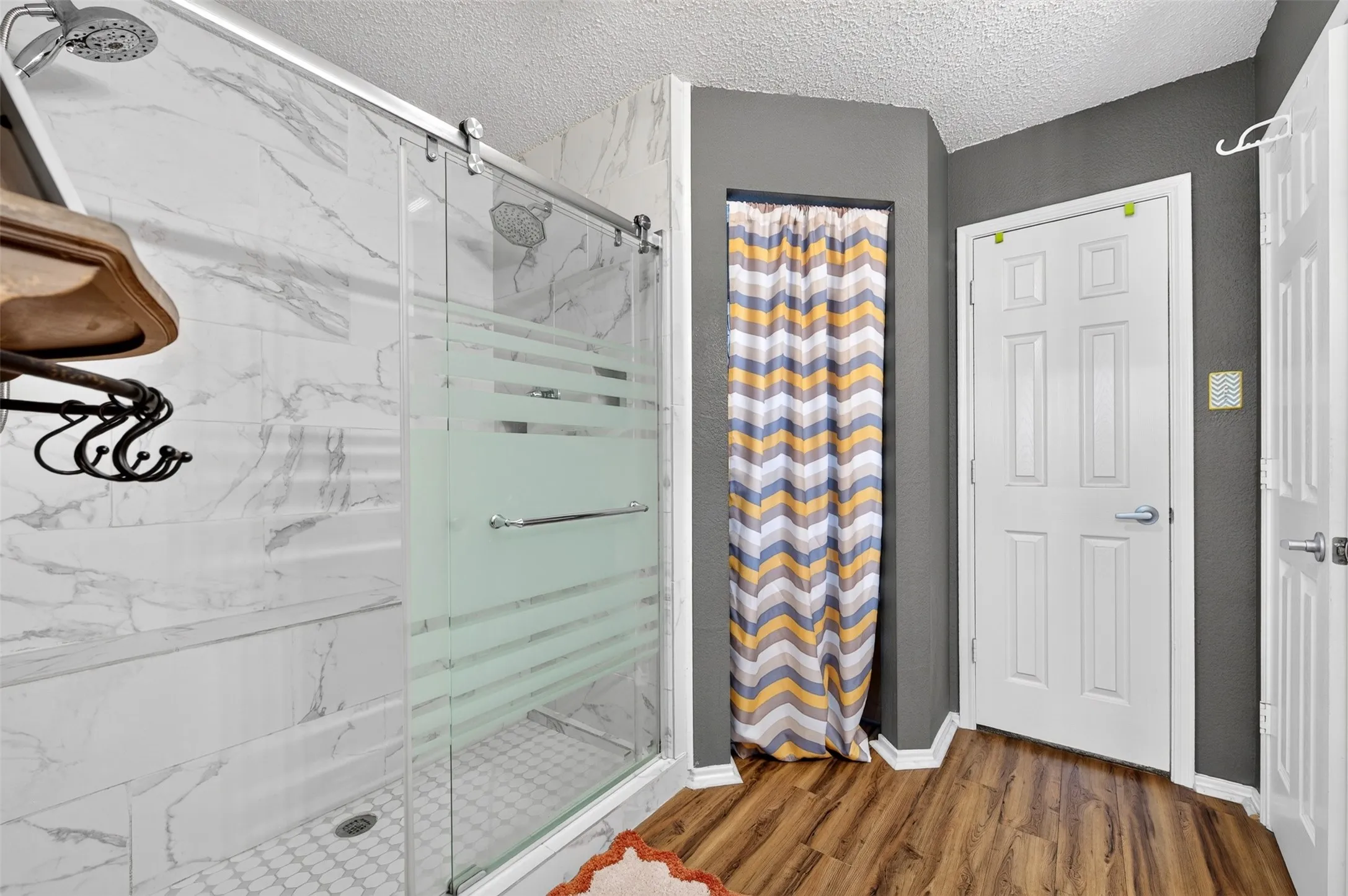 Primary Bathroom with an updated walk-in shower