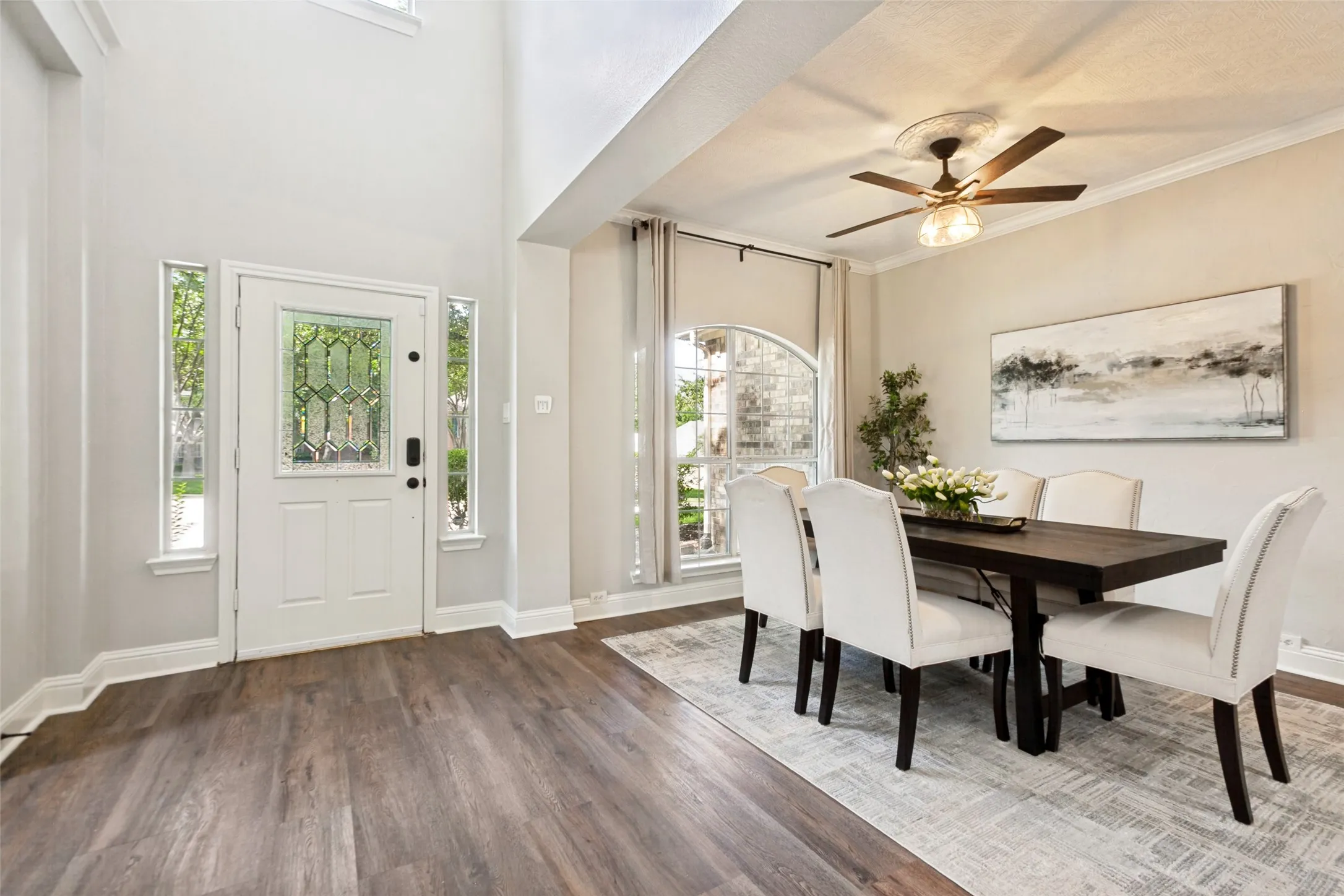 Large Formal Dining Room with Tray Ceiling with beautiful front door!