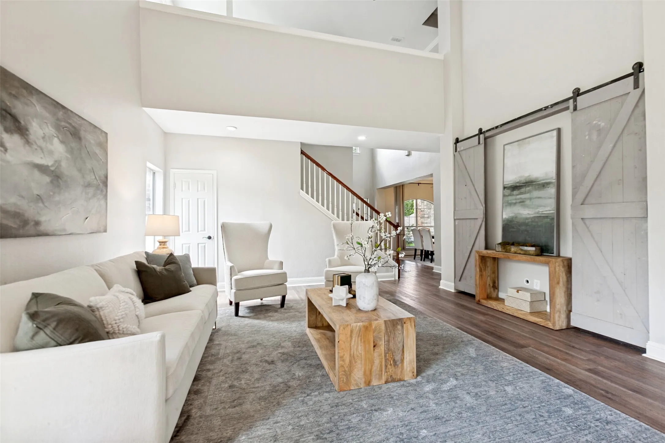 Cute Barn Door Effect to frame your TV, High Vaulted Ceilings and Tons of Natural Light!  Oh MY!
