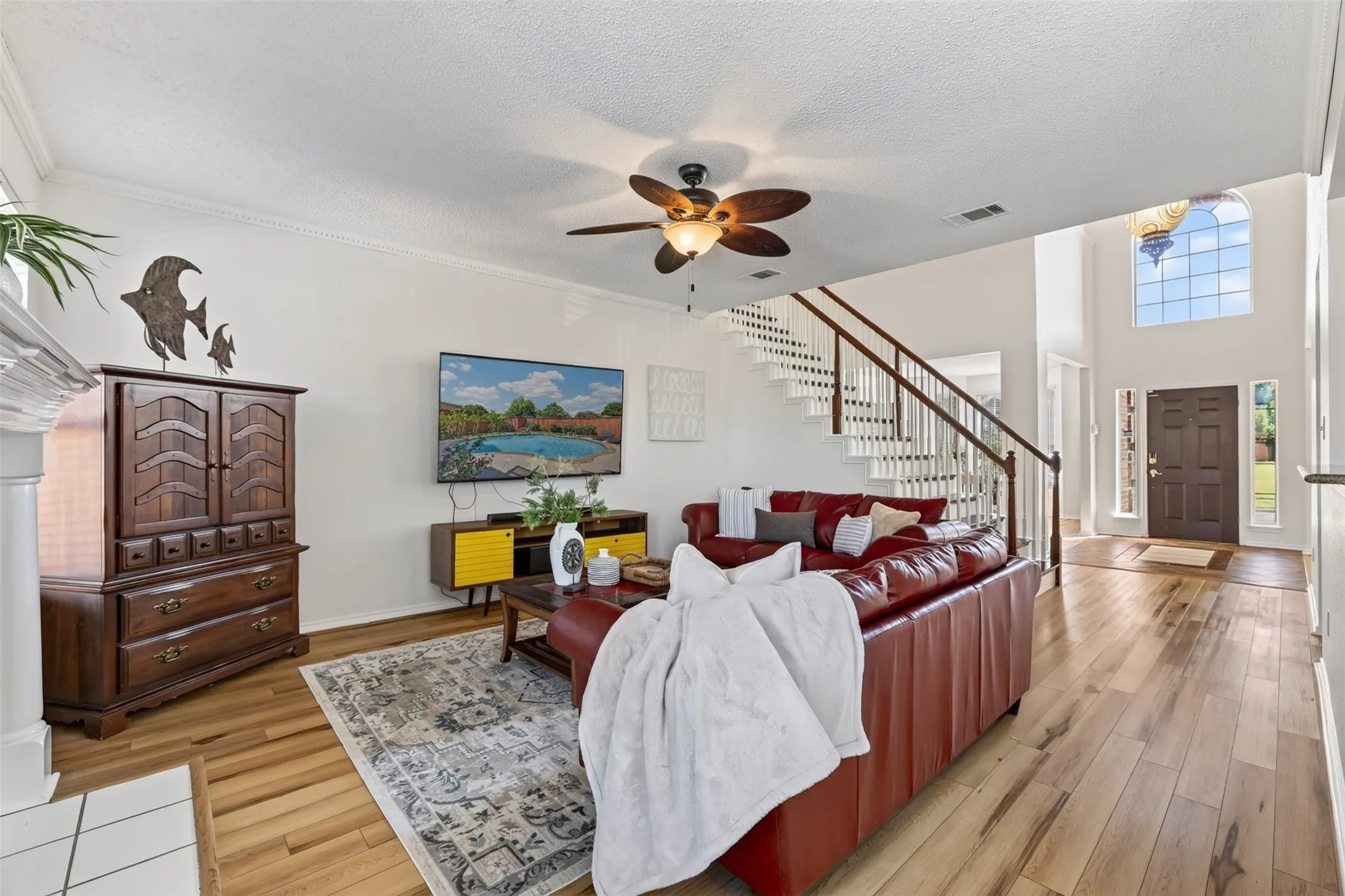 Family room with wood burning fireplace.