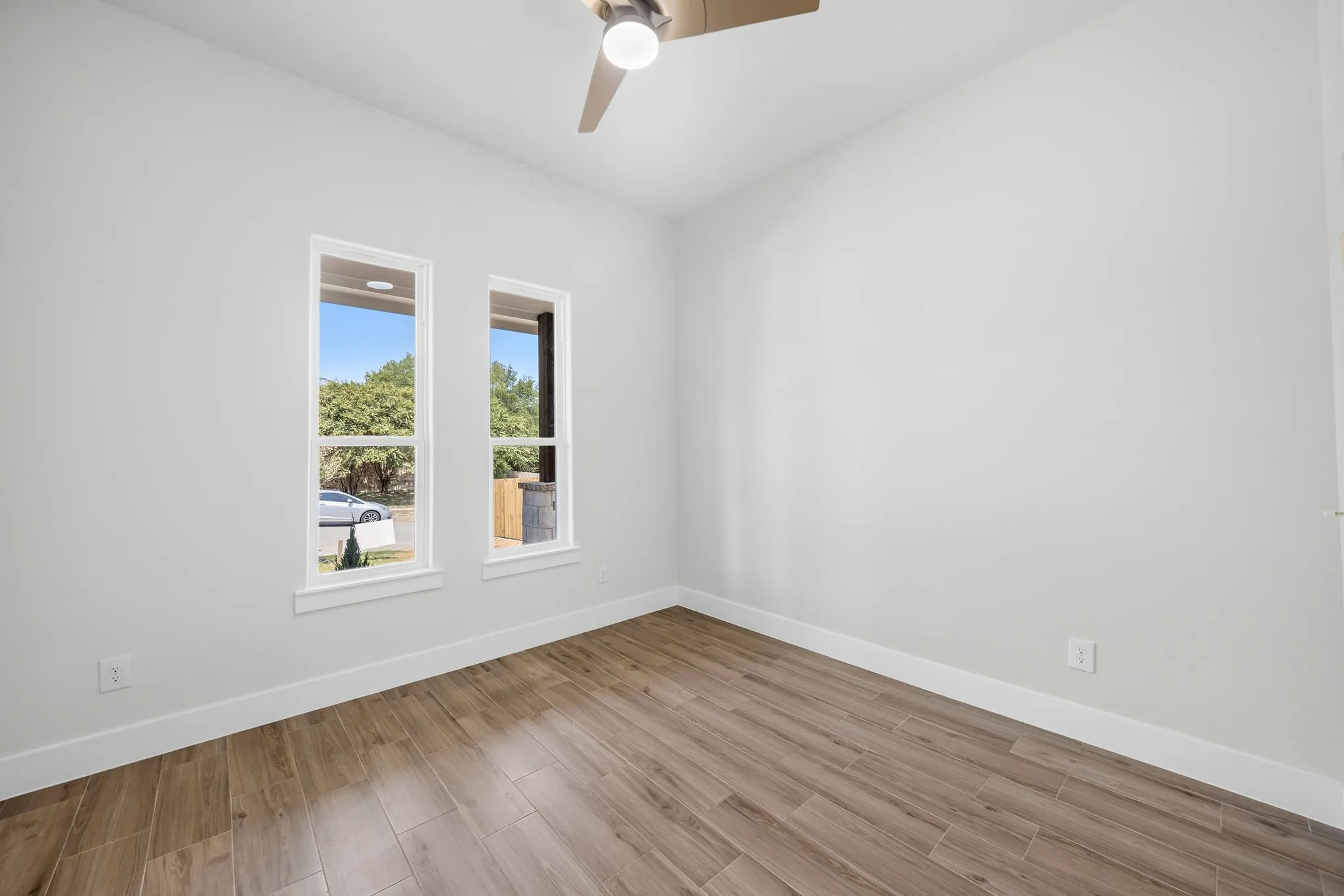 Wood-finish flooring with white trim